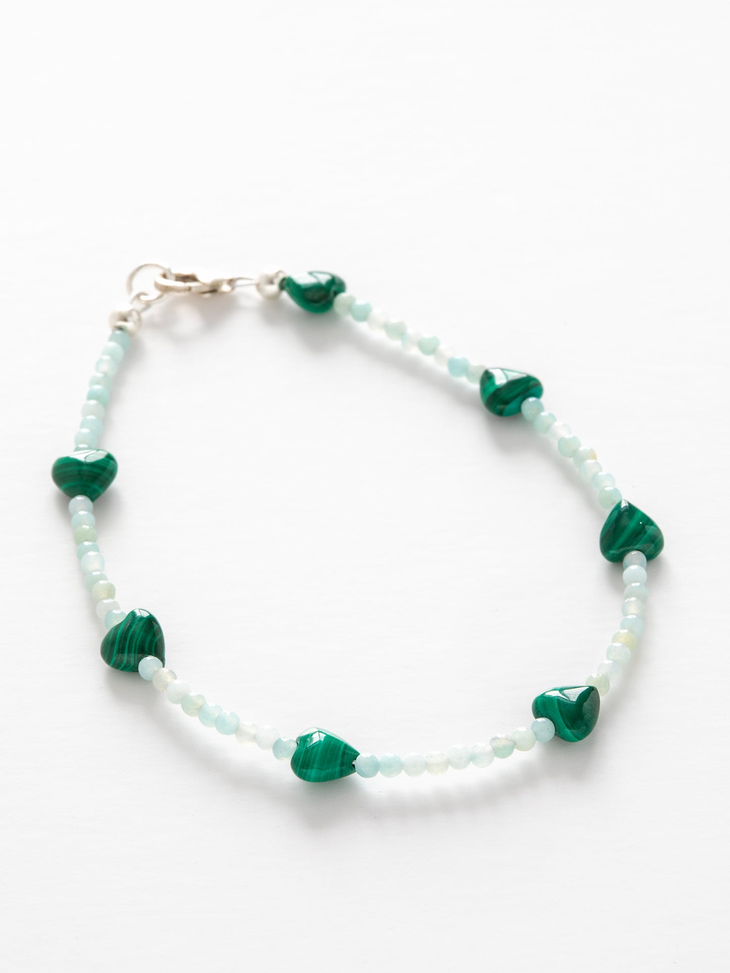 One-of-a-kind natural crystal designer bracelet with sterling silver hardware, designed & handmade in California. Stones are Amazonite & Malachite.