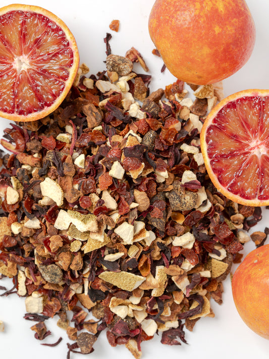 Organic Rosehip Orange Apple Anti-Inflammatory Herbal Tea with Hibiscus & Apricot, Brews to create a light orange color, Hibiscus & Rose Hips provide antioxidants anthocyanins & vitamin C, Orange Peels contain limonene, polyphenols, as well as flavonoids, such as hesperidin, Apples contain quercetin, Apricots contain vitamin C, Vitamin A, & beta-carotene, Caffeine free, Can be served hot or cold.