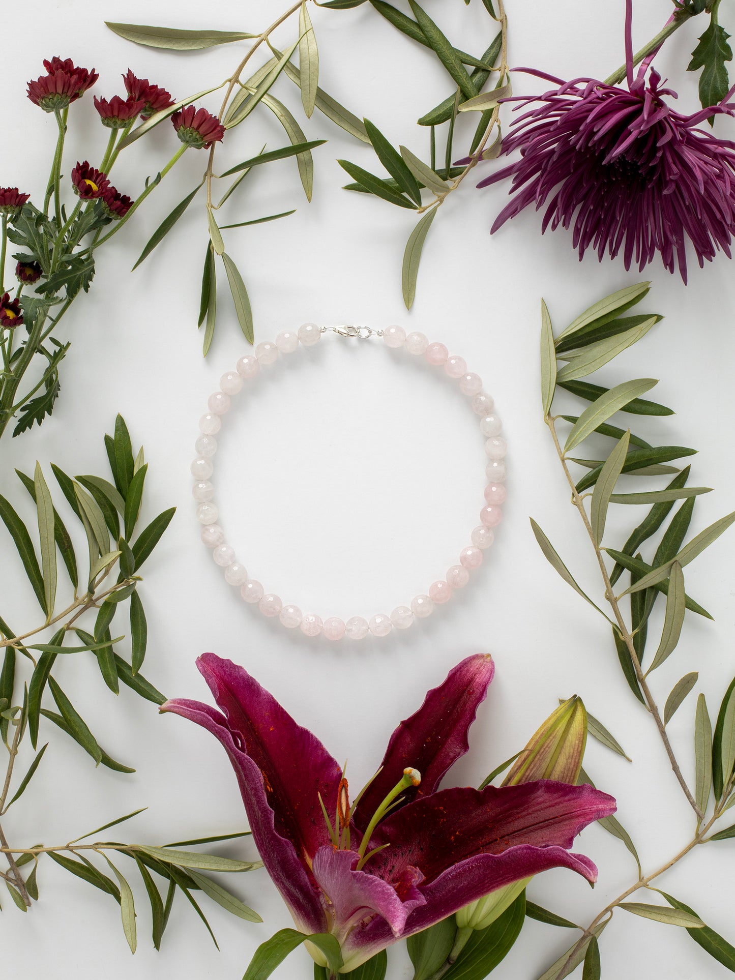One-of-a-kind natural Rose Quartz crystal designer bracelet with sterling silver hardware, designed & handmade in California.