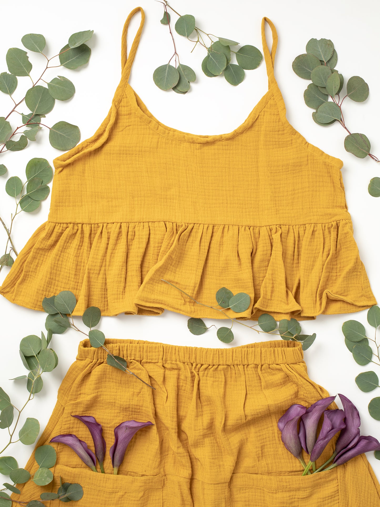 Fun Time Top in Golden Yellow - Comes in 6 different colors: Sky Blue, Sage Green, Lavender Purple, Bright White, Golden Yellow, Desert Taupe, Coral Pink, & Jet Black, Easy fit designed to look good on any shape or size, XS, S, M, L, XL, 100% Organic Cotton Double Gauze. Designed & Made in California.