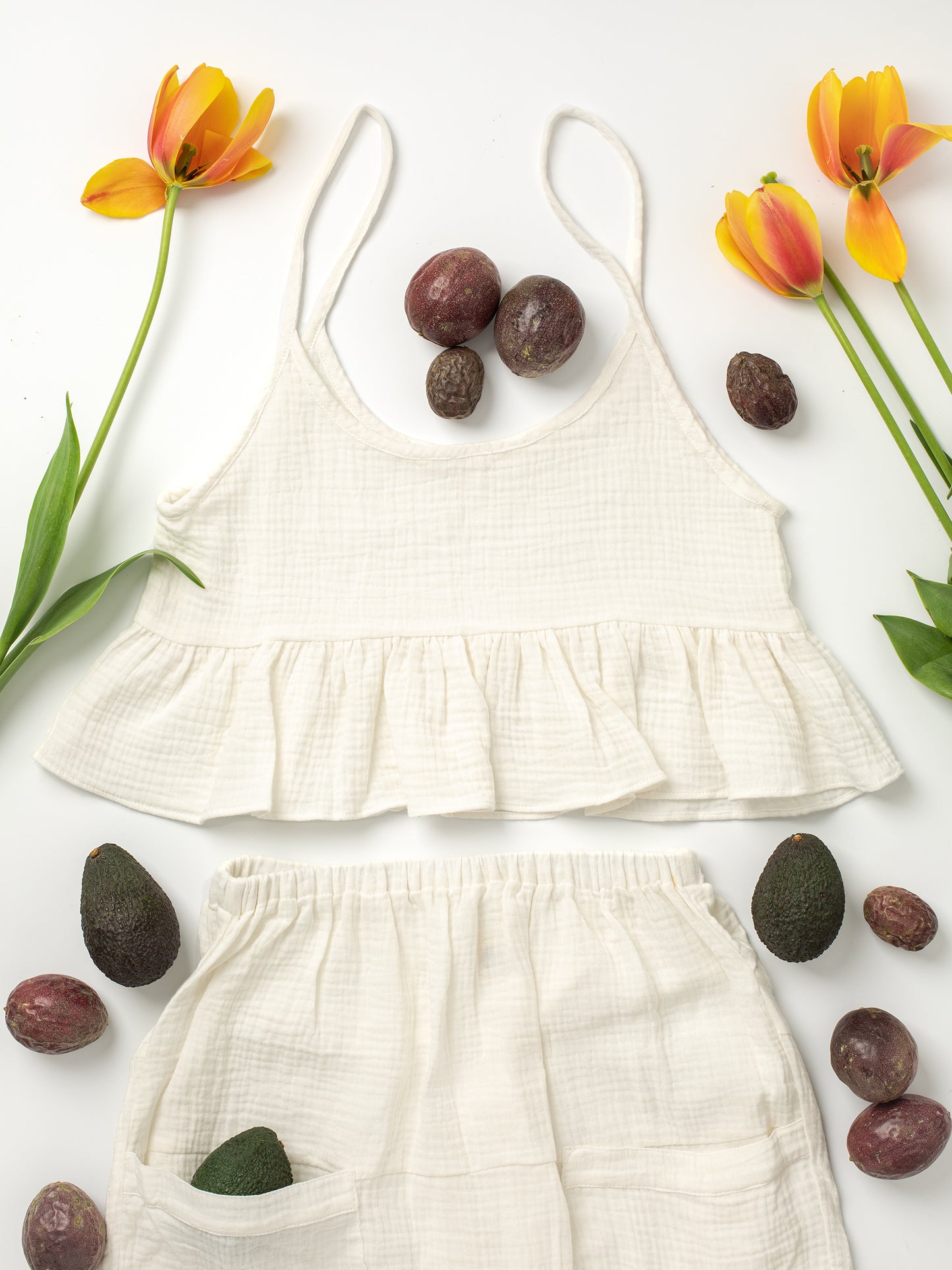 Fun Time Top in Bright White - Comes in 6 different colors: Sky Blue, Sage Green, Lavender Purple, Bright White, Golden Yellow, Desert Taupe, Coral Pink, & Jet Black, Easy fit designed to look good on any shape or size, XS, S, M, L, XL, 100% Organic Cotton Double Gauze. Designed & Made in California.