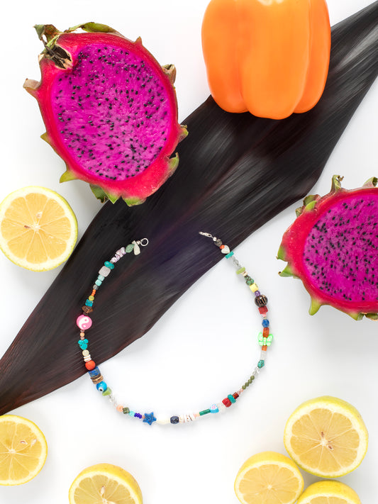 Anse Noire Necklace (#064), Abalone, Amethyst, Amazonite, Apatite, Black Lava Rock, Blue Lapis, Carnelian, Citrine, Coconut Shells, Green Jade, Howlite, Labradorite, Malachite, Moonstone, Mother of Pearl, Natural Shells, Peridot, Pink Coral, Purple Fluorite, Red Coral, Rhodonite, Rose Quartz, Serpentine, Turquoise, Sterling Silver clasp, One-of-a-kind, Designed & handmade in California.