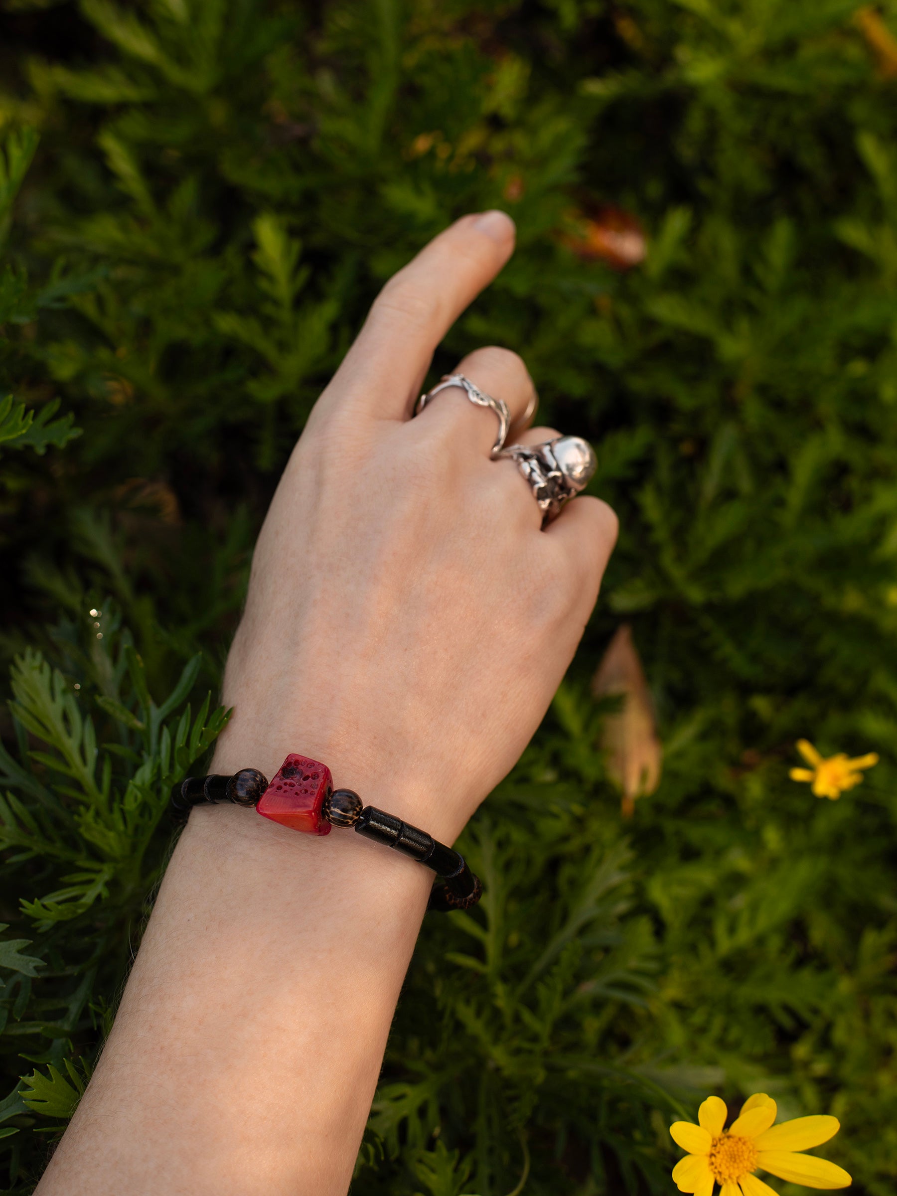 One-of-a-kind natural Red & Black Coral & Coconut Shell designer bracelet with coconut shells & sterling silver hardware, designed & handmade in California.