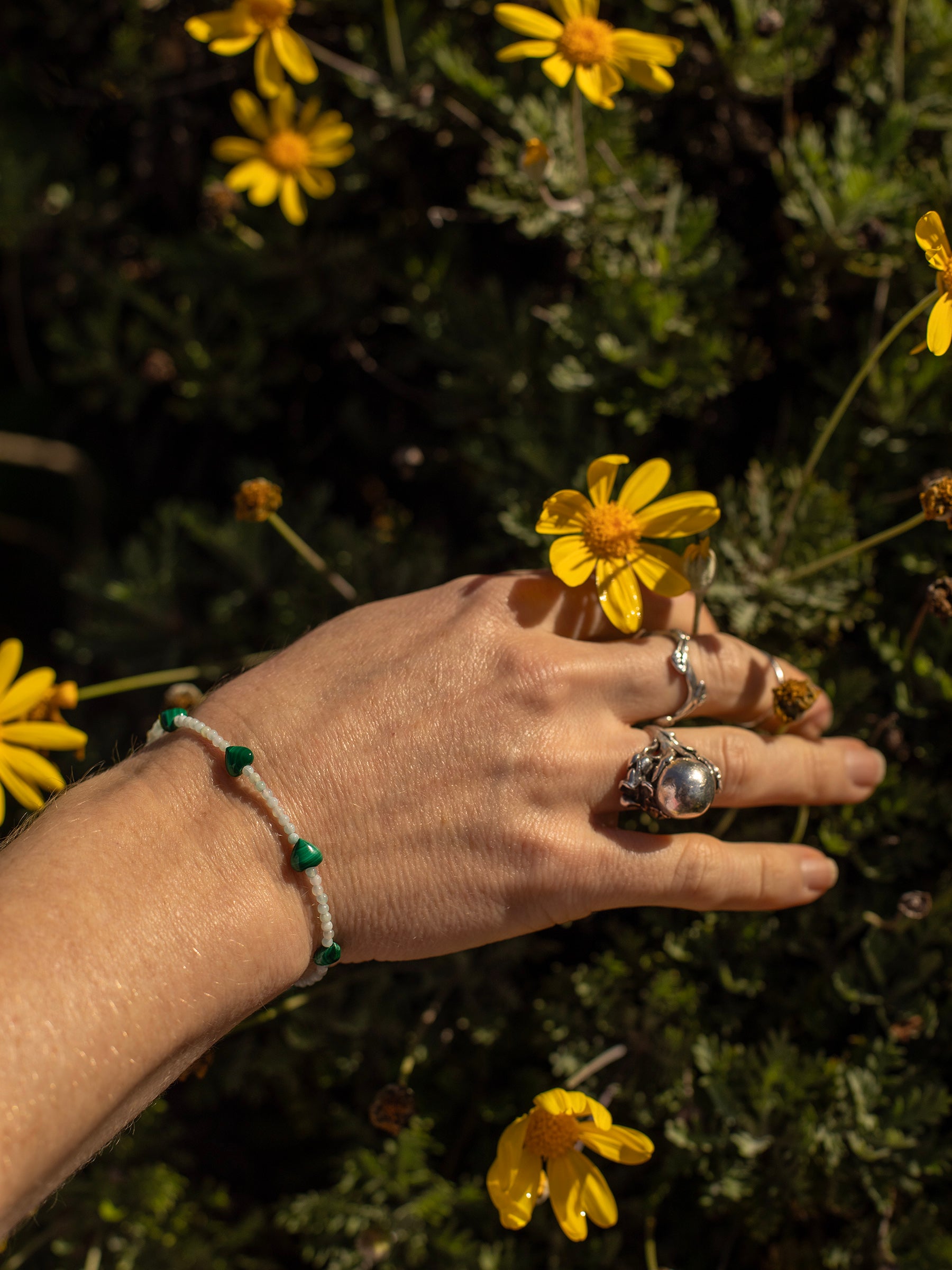 One-of-a-kind natural crystal designer bracelet with sterling silver hardware, designed & handmade in California. Stones are Amazonite & Malachite.