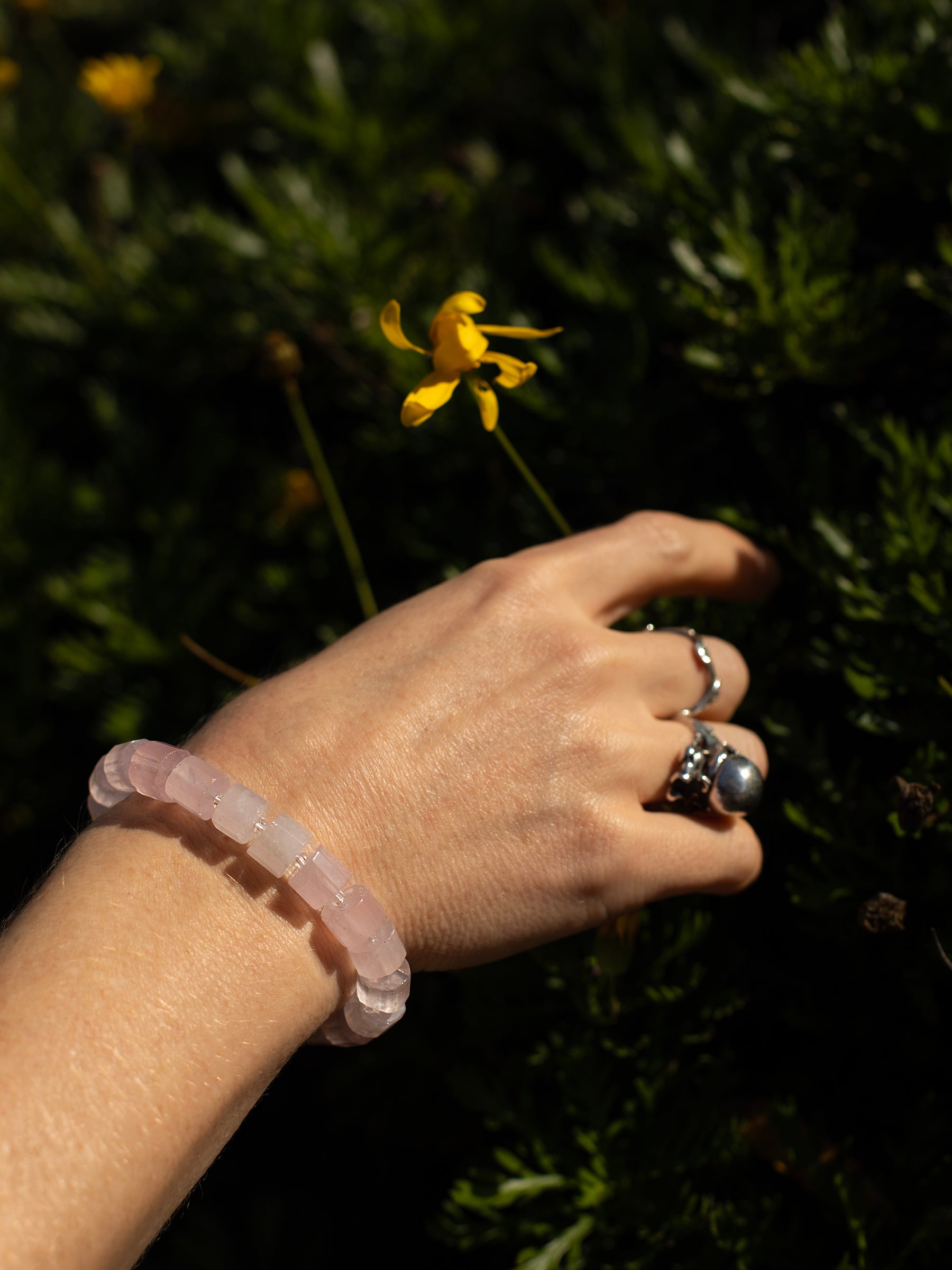 One-of-a-kind natural crystal designer bracelet with sterling silver hardware, designed & handmade in California. Crystals include Quartz & Rose Quartz.