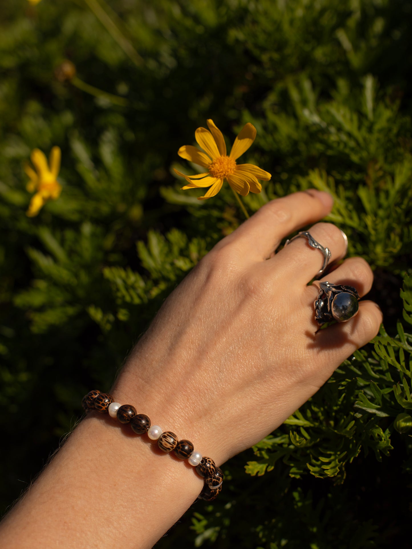 One-of-a-kind natural Pearl & Coconut Shell designer bracelet with sterling silver hardware, designed & handmade in California.