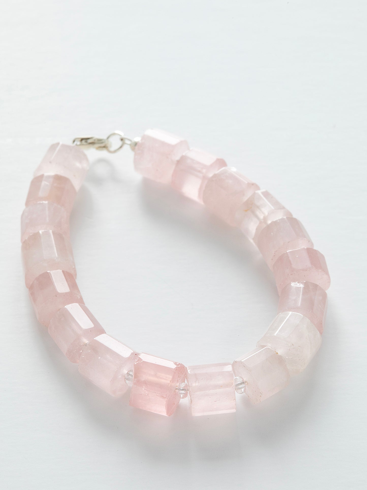 One-of-a-kind natural crystal designer bracelet with sterling silver hardware, designed & handmade in California. Crystals include Quartz & Rose Quartz.