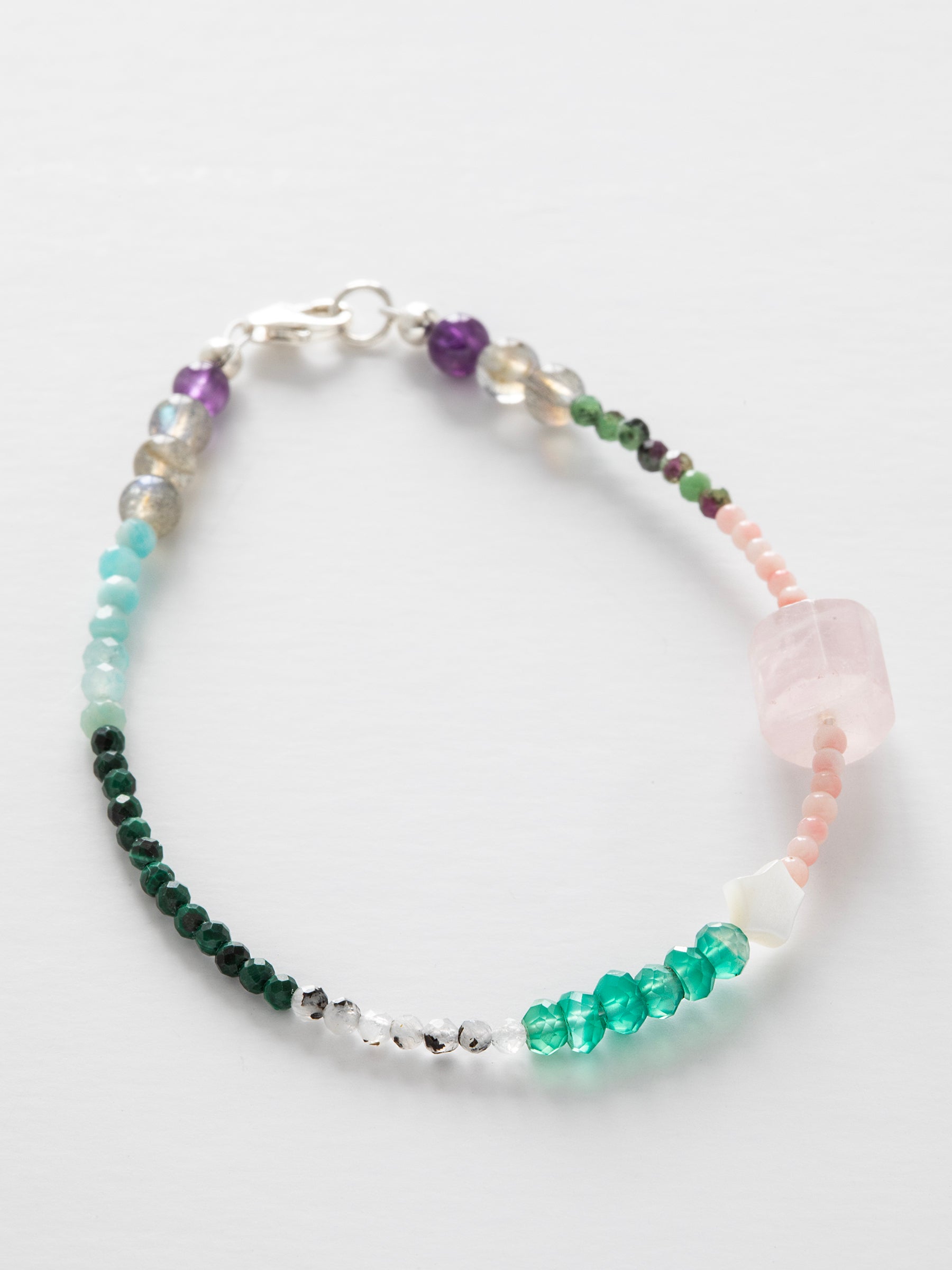 One-of-a-kind Amazonite, Amethyst, Aventurine, Labradorite, Malachite, Moonstone, Mother of Pearl, Pink Coral, Rose Quartz, & Ruby Zoisite designer bracelet with sterling silver hardware, designed & handmade in California.