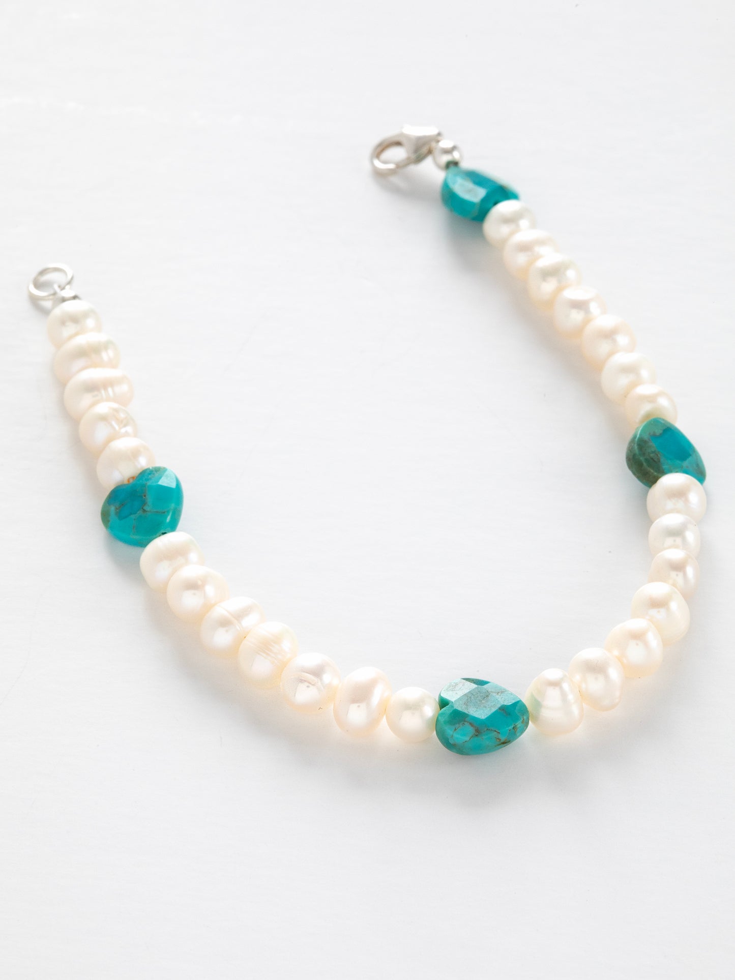 One-of-a-kind Freshwater Pearl & Turquoise designer bracelet with sterling silver hardware, designed & handmade in California.