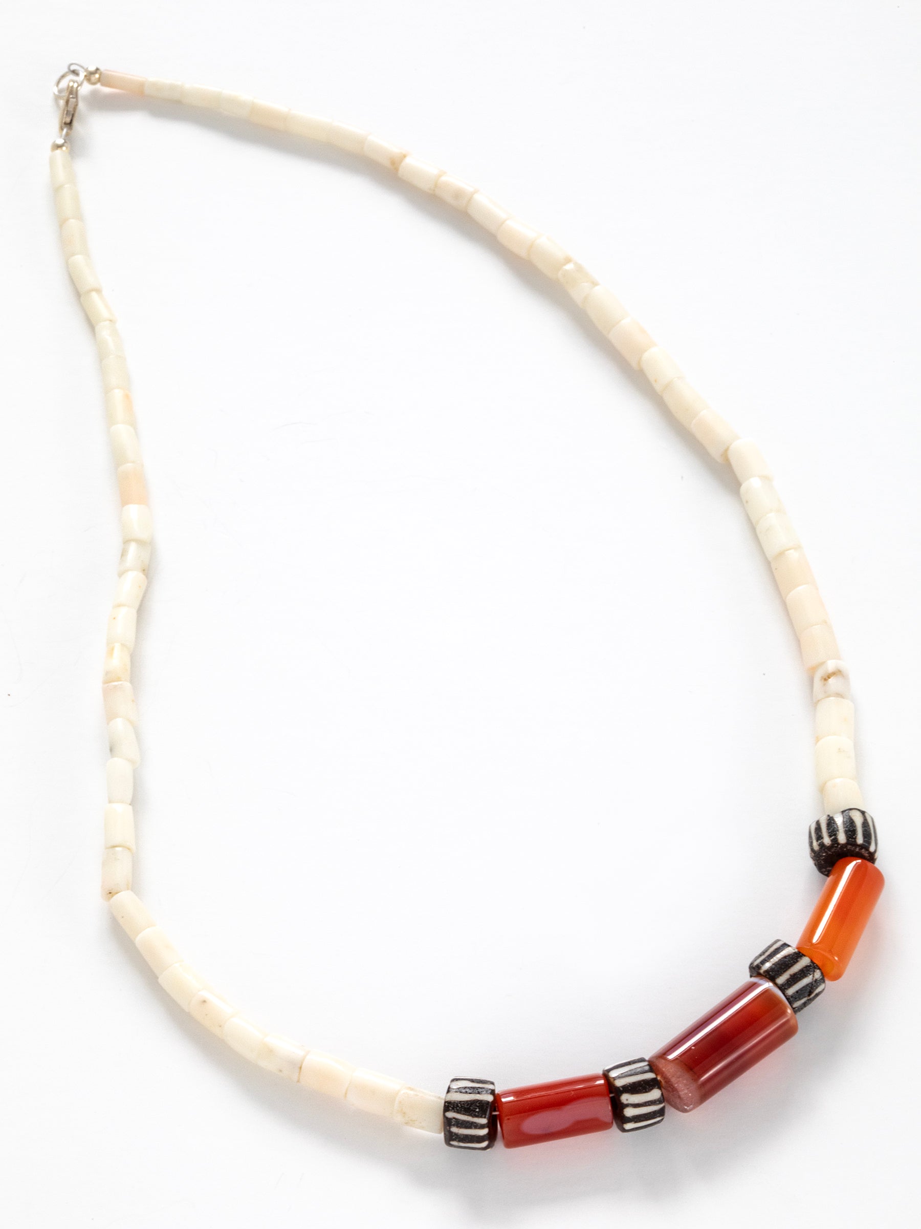 One-of-a-kind natural shell & stone designer necklace with sterling silver hardware, designed & handmade in California.