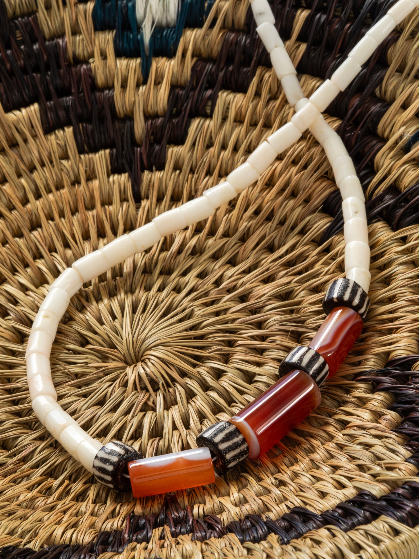 One-of-a-kind natural shell & stone designer necklace with sterling silver hardware, designed & handmade in California.