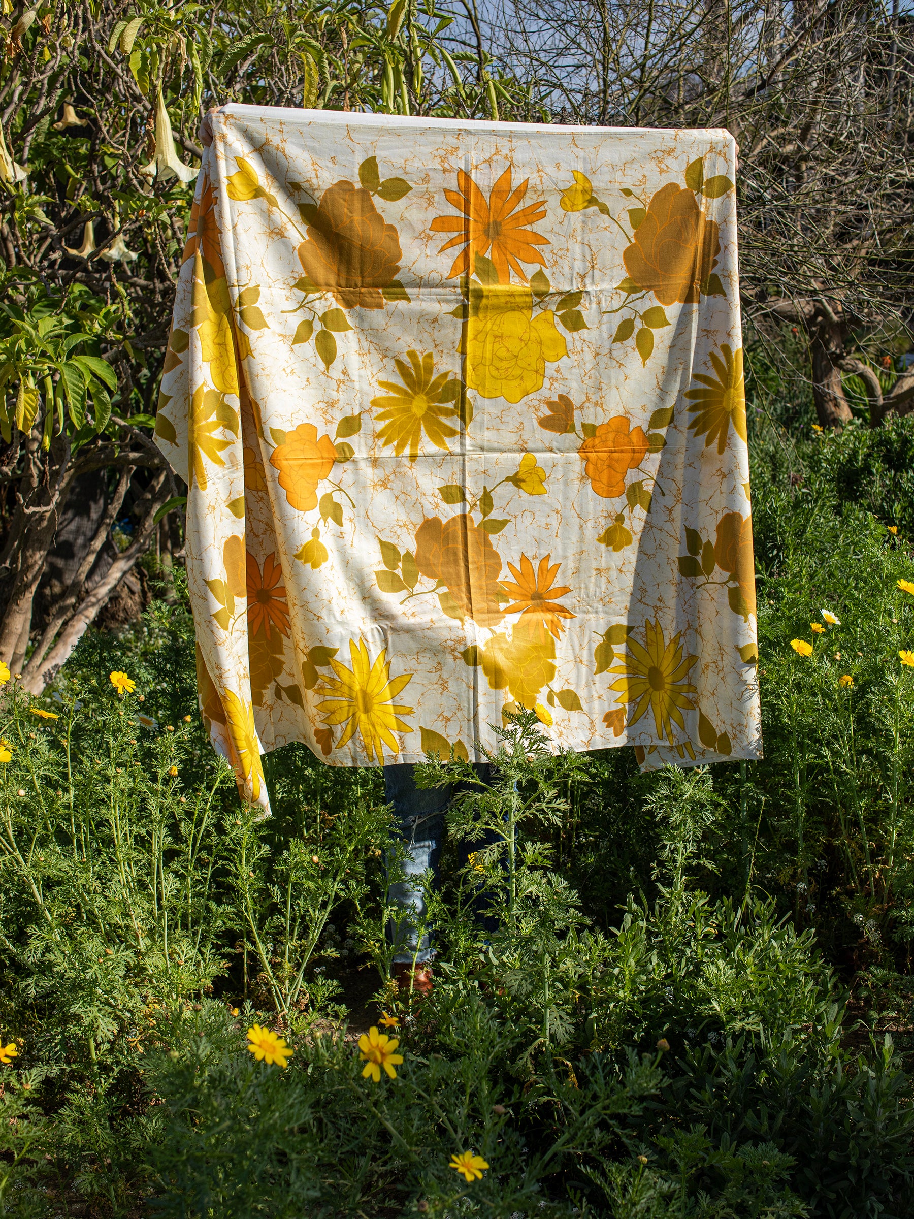 Vintage Psychedelic Yellow & Orange Floral Batik Woven Cotton Chintz Fabric, Classic Flower Power 60s Color Palette, Cream-colored background with oranges, yellows, avocado green colors, Mid Century, 1960s, Cotton chintz, Block printed batik design with roses & daisies, New, Sourced in California.