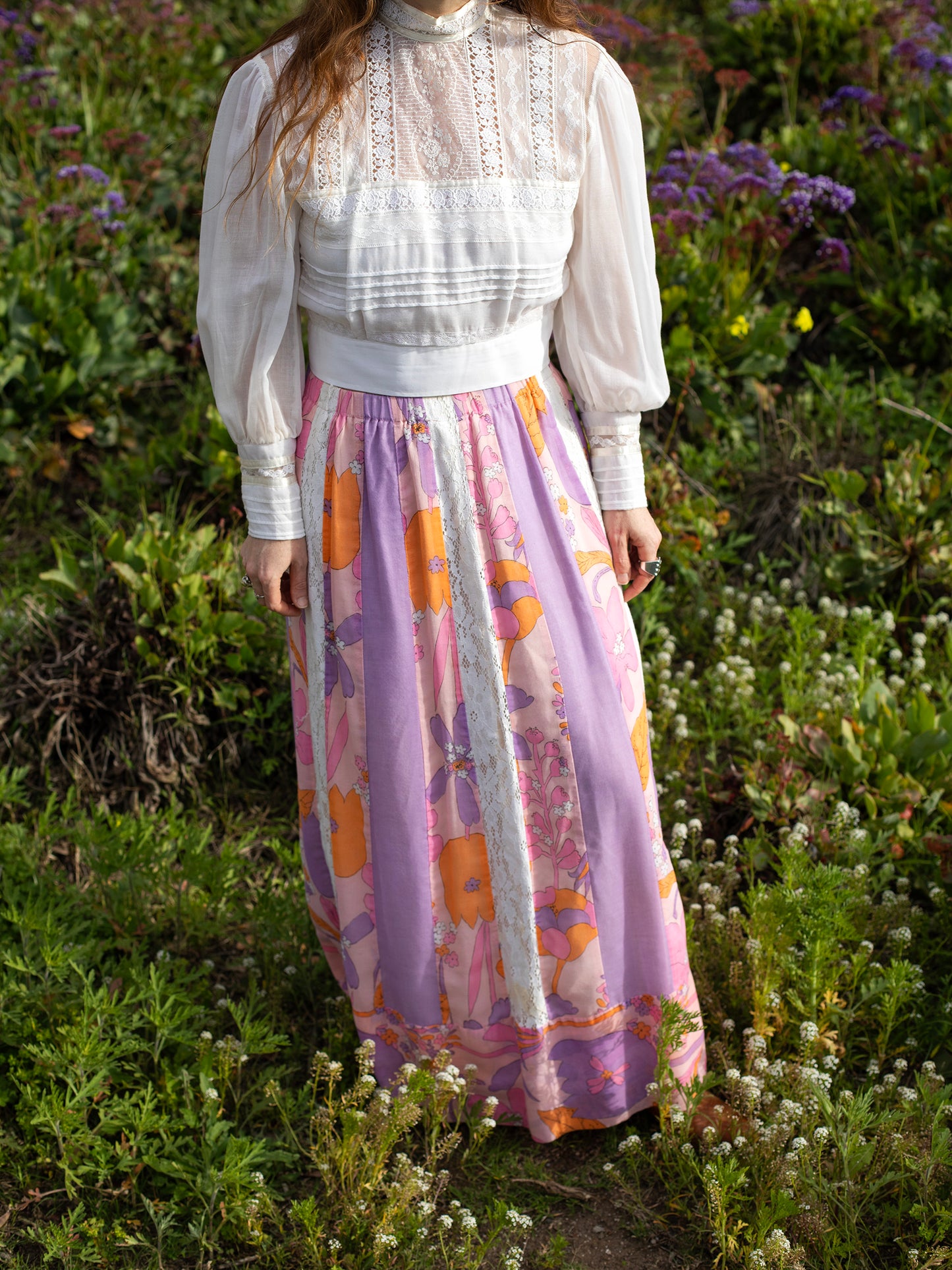 Vintage Psychedelic Pink & Lavender Patchwork Cotton Skirt, Lavender, Pink, Vibrant Orange, & Cream colors, Mid Century, 1960s, Definitely homemade, with each panel a different color, Vibrant Summer of Love floral print on cotton, Cotton Lace paneling, Hidden elastic waistband, Sourced in California.