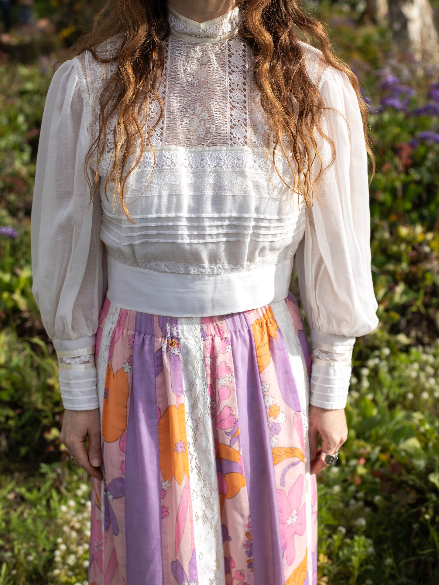 Vintage Psychedelic Pink & Lavender Patchwork Cotton Skirt, Lavender, Pink, Vibrant Orange, & Cream colors, Mid Century, 1960s, Definitely homemade, with each panel a different color, Vibrant Summer of Love floral print on cotton, Cotton Lace paneling, Hidden elastic waistband, Sourced in California.