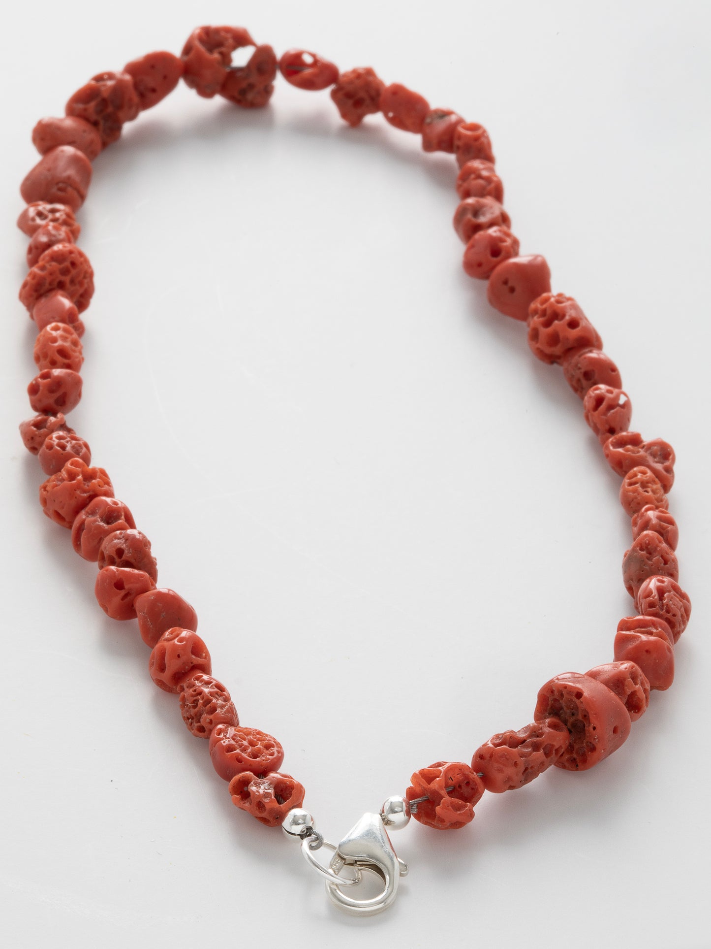 One-of-a-kind natural stone designer bracelet with sterling silver hardware, designed & handmade in California. Stones are Antique Mediterranean Red Coral.