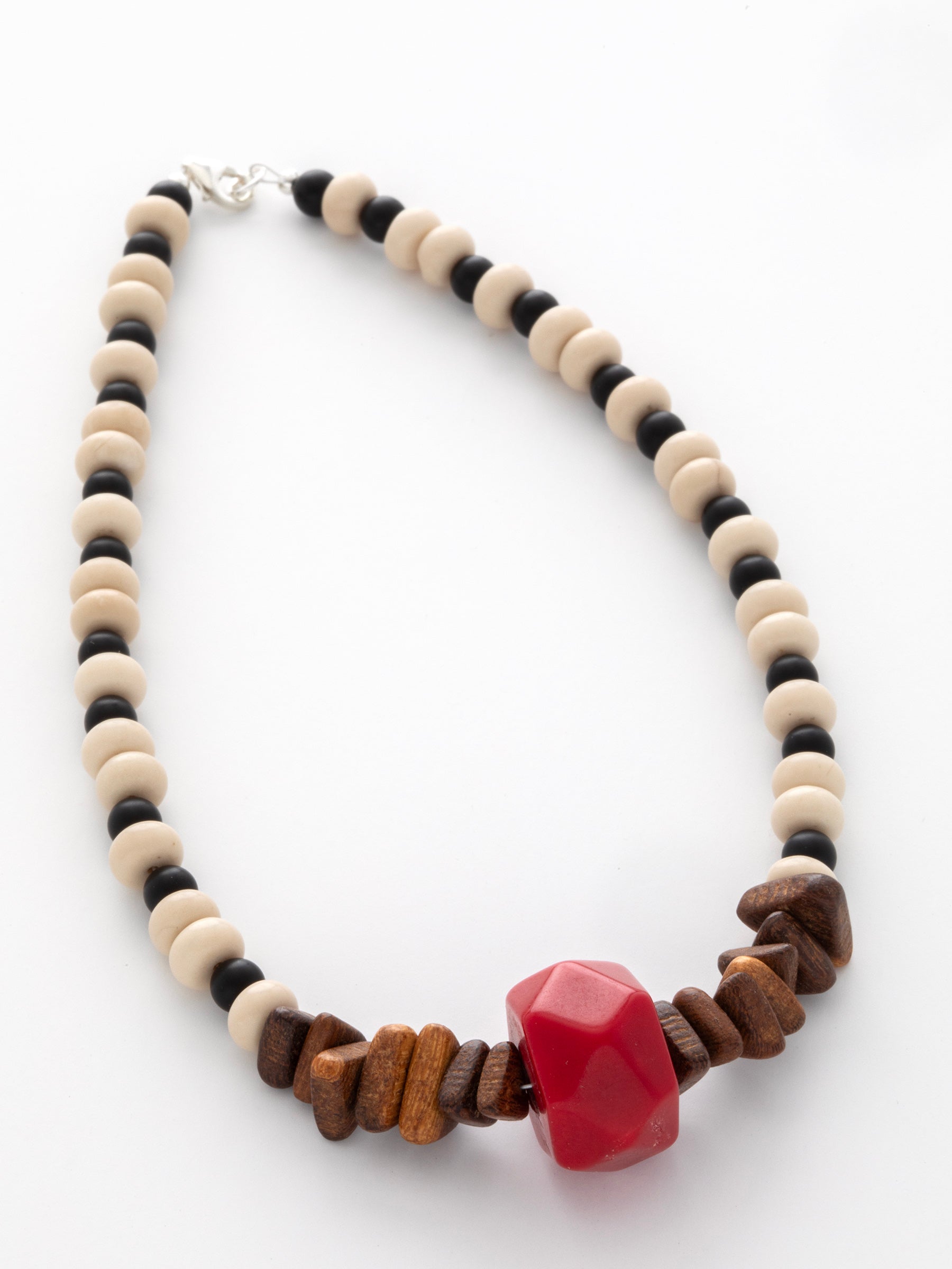 One-of-a-kind natural Howlite, Onyx, Red Coral, & Wood designer bracelet with sterling silver hardware, designed & handmade in California.