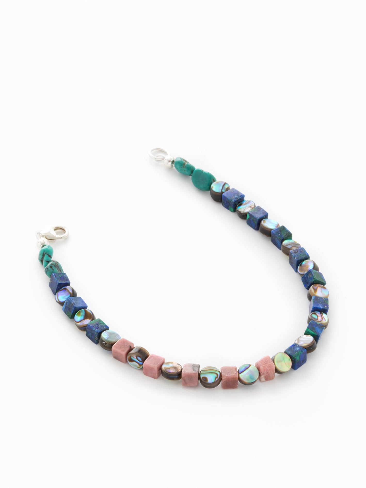 One-of-a-kind natural crystal & shell designer bracelet with sterling silver hardware, designed & handmade in California. Crystals & shells include Abalone, Azurite, Malachite, Rhodonite, & Turquoise.