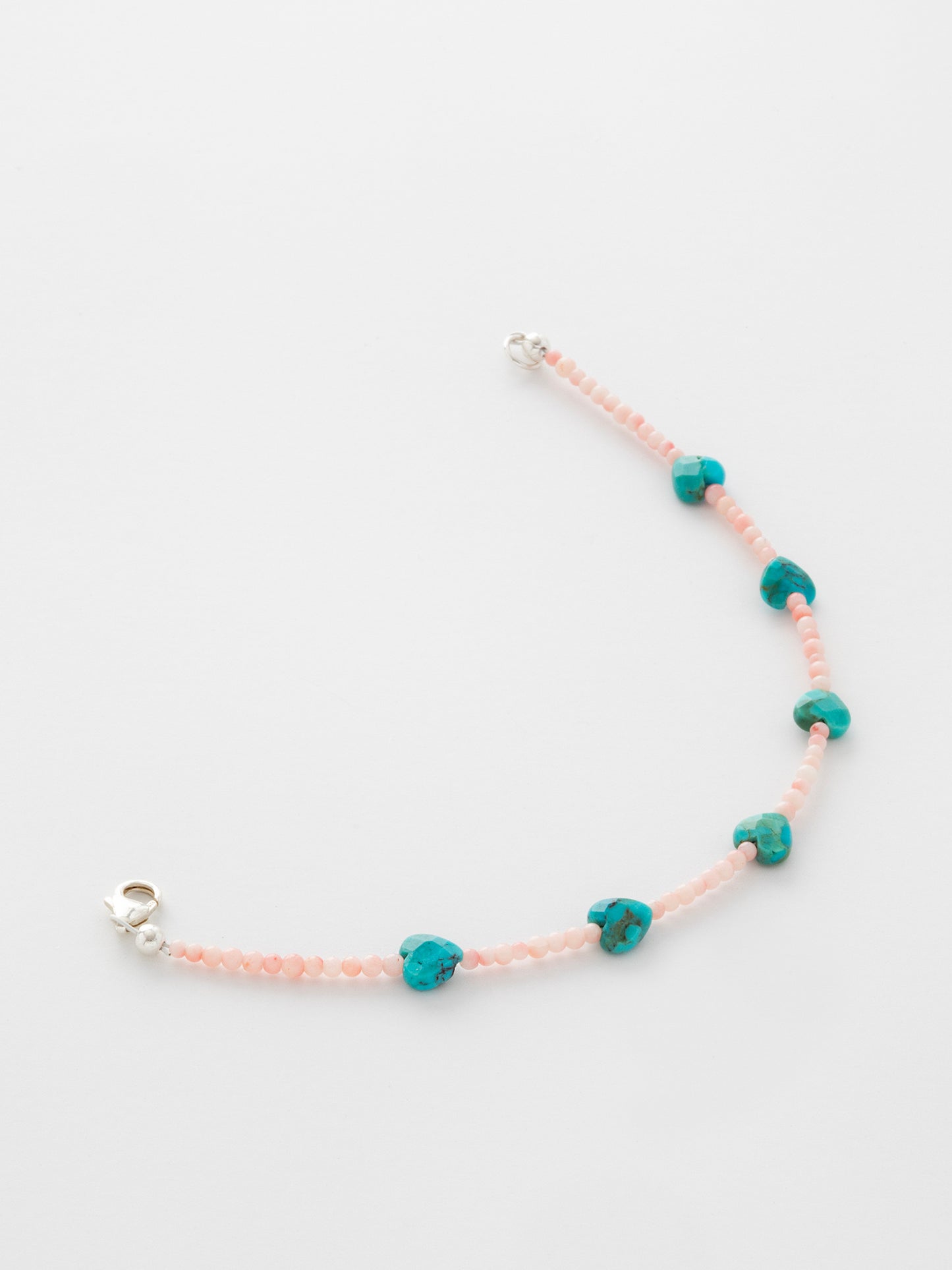 One-of-a-kind natural Turquoise crystal & Pink Coral shell designer bracelet with sterling silver hardware, designed & handmade in California.