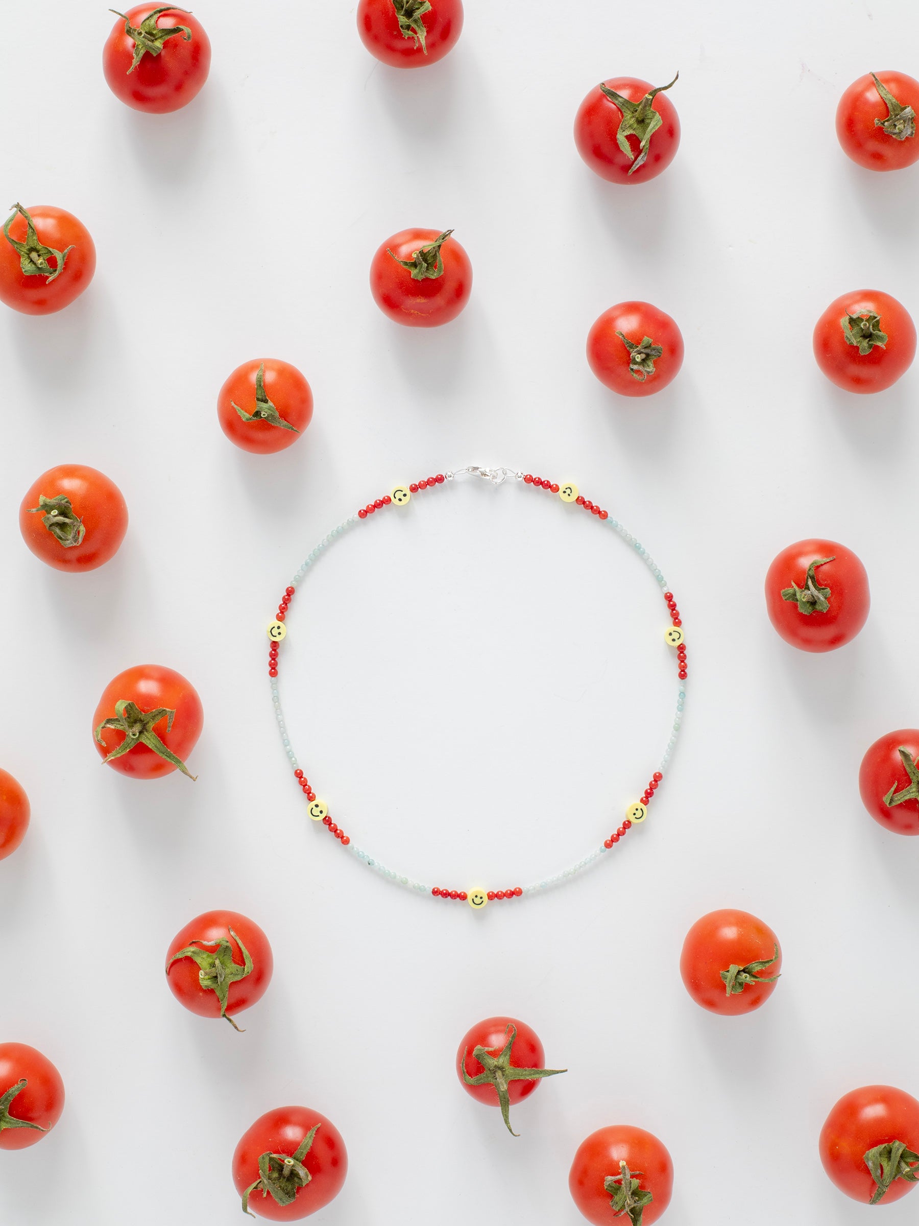 One-of-a-kind natural Amazonite, Red Coral, & Smiley Face designer bracelet with sterling silver hardware, designed & handmade in California.