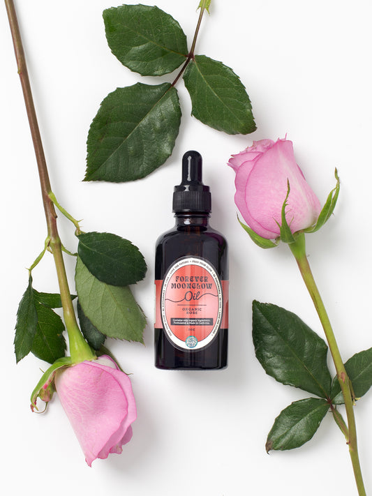 Forever Moonglow Organic Rose Face & Body Oil, Protects the skin's lipid layer, Supports collagen + elastin, Encourages cell turnover, Increases hydration, Reduces inflammation, Moisturizes, Brightens skin tone, Provides important antioxidants, Handmade in small batches, Made in California.