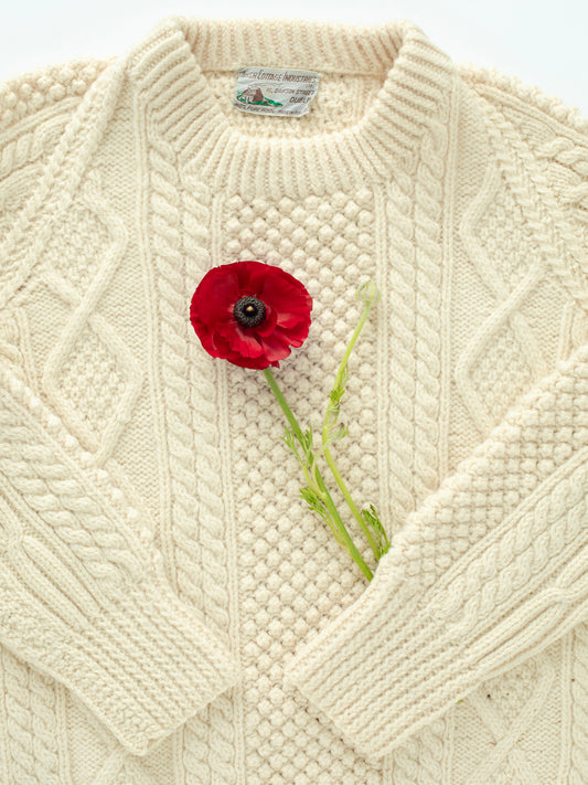 Vintage Cream-Colored Fisherman's Cableknit Irish Wool Sweater (1960s), Cream color, Coughlin Clan Pattern, Brand tag "Irish Cottage Industries LTD. 18 Dawson Street, Dublin" Fits modern Women's S/M, No size tag, 100% Pure Wool, Made in Ireland.