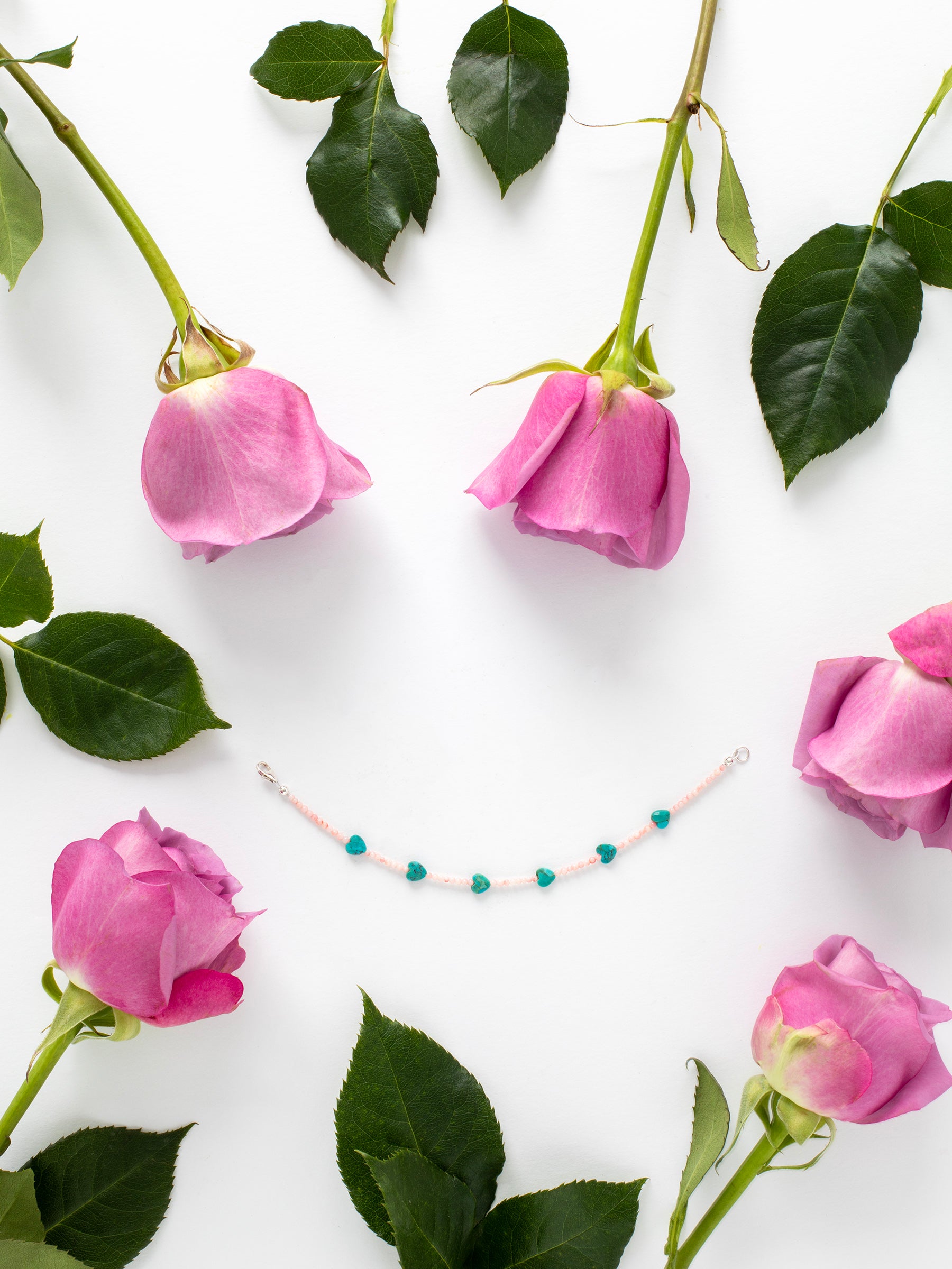 One-of-a-kind natural Turquoise crystal & Pink Coral shell designer bracelet with sterling silver hardware, designed & handmade in California.