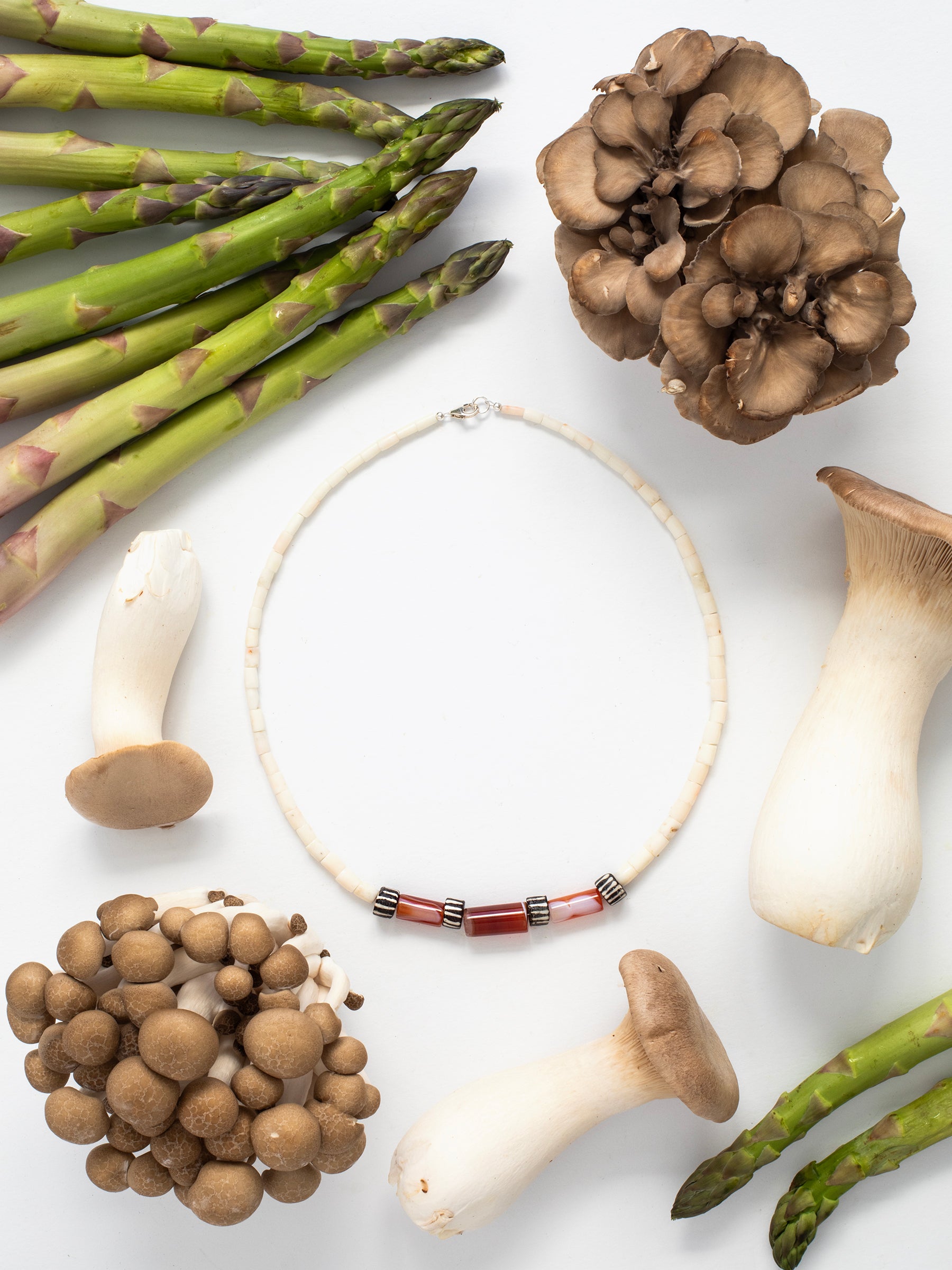 One-of-a-kind natural shell & stone designer necklace with sterling silver hardware, designed & handmade in California.