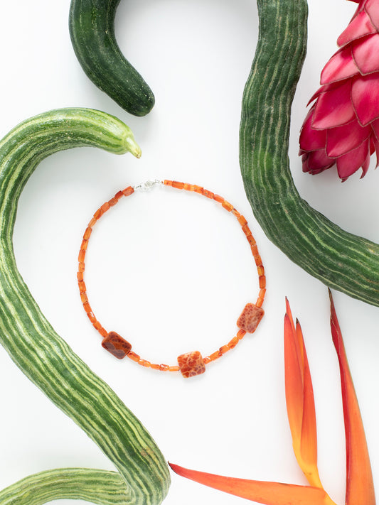 One-of-a-kind natural crystal designer bracelet with sterling silver hardware, designed & handmade in California. Crystals include Carnelian & Fire Agate.