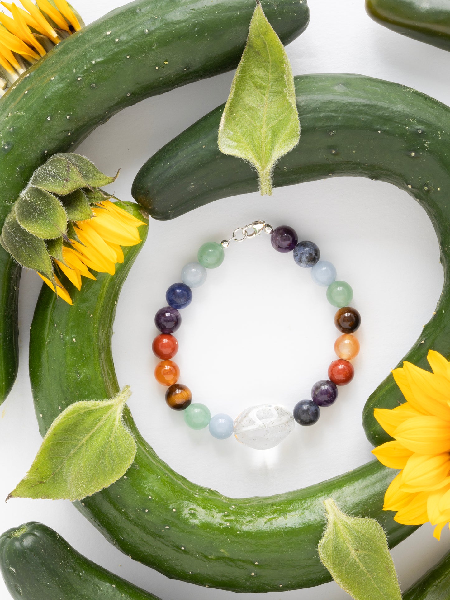 One-of-a-kind Amethyst, Aventurine, Blue Calcite, Blue Lapis, Carnelian, Quartz, Red Jasper, & Tiger's Eye designer bracelet with sterling silver hardware, designed & handmade in California.