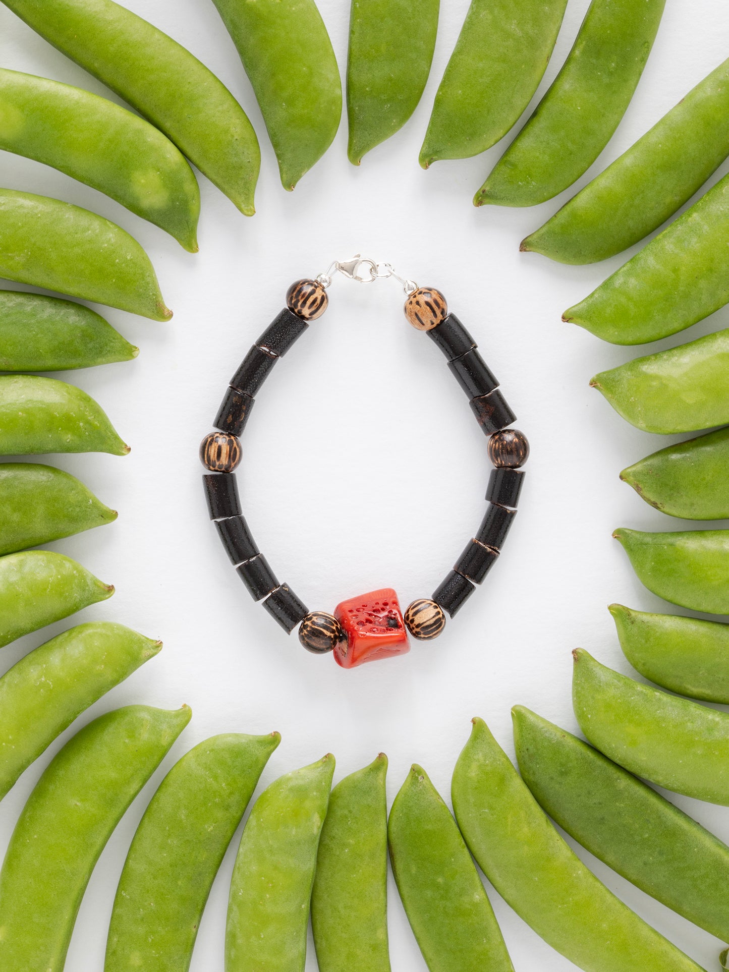 One-of-a-kind natural Red & Black Coral & Coconut Shell designer bracelet with coconut shells & sterling silver hardware, designed & handmade in California.