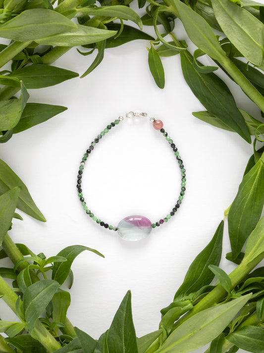 One-of-a-kind natural crystal designer bracelet with sterling silver hardware, designed & handmade in California. Crystals include Purple Fluorite, Rhodonite, & Ruby Zoasite.