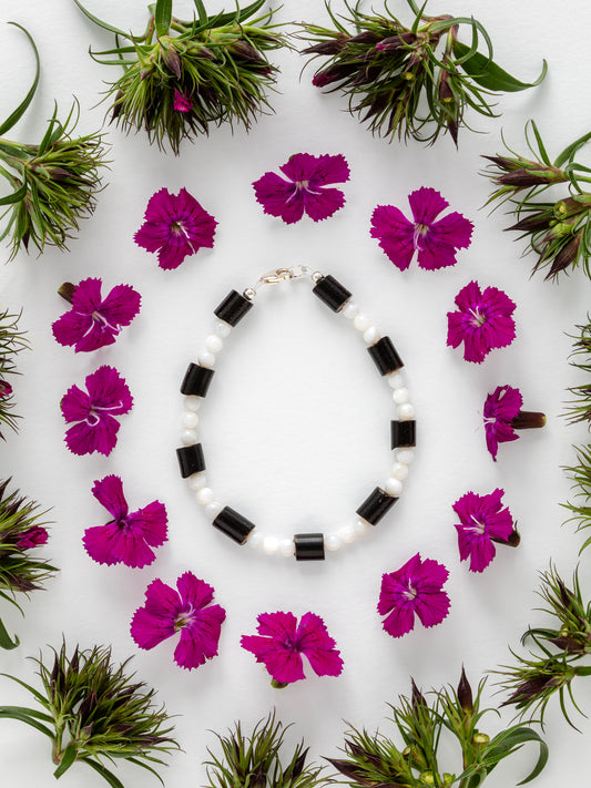 One-of-a-kind natural Black Coral & Mother of Pearl designer bracelet with sterling silver hardware, designed & handmade in California.