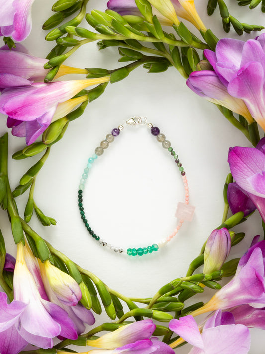 One-of-a-kind Amazonite, Amethyst, Aventurine, Labradorite, Malachite, Moonstone, Mother of Pearl, Pink Coral, Rose Quartz, & Ruby Zoisite designer bracelet with sterling silver hardware, designed & handmade in California.