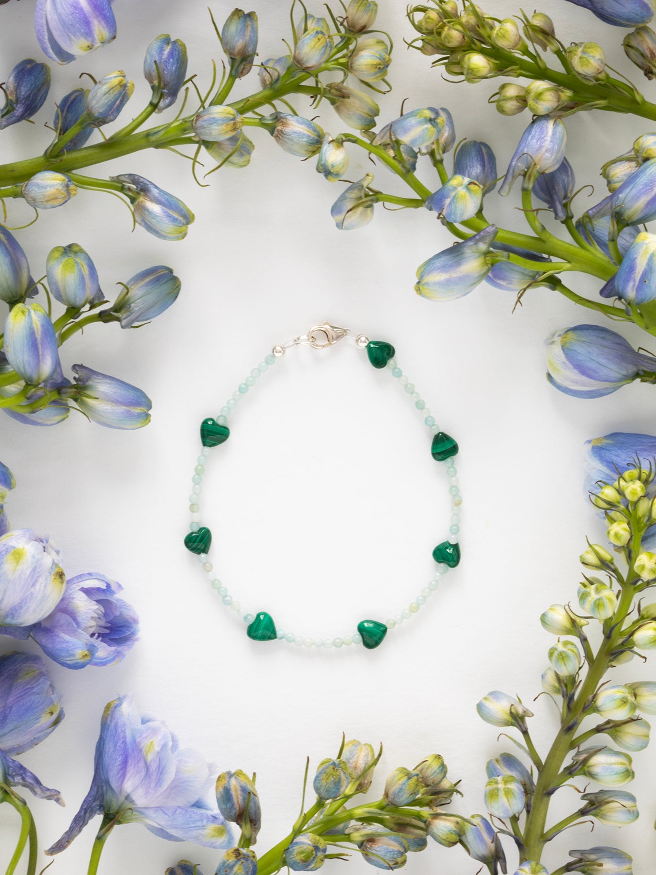 One-of-a-kind natural crystal designer bracelet with sterling silver hardware, designed & handmade in California. Stones are Amazonite & Malachite.