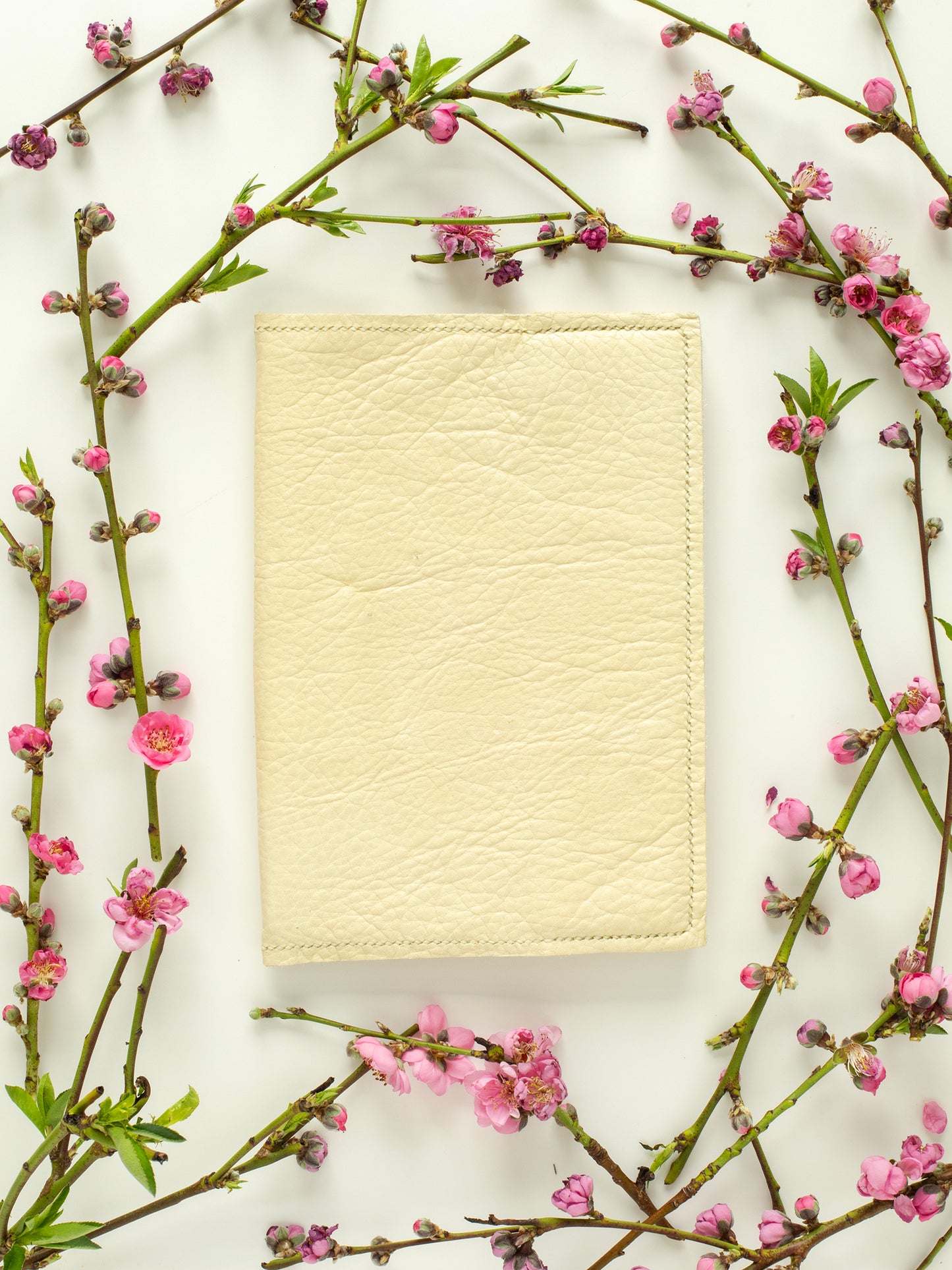 Sustainable Leather Notebook/Journal Cover in Ivory color buttery-soft Buffalo/Bison Leather, hand-stitched & designed & handmade in Colorado, fits all standard size A5 notebooks, measurements 6.5in x 9.13in (16.51cm x 23.18cm).