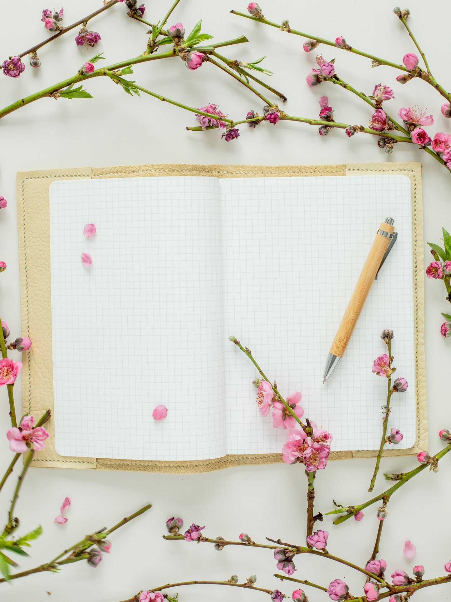 Sustainable Leather Notebook/Journal Cover in Ivory color buttery-soft Buffalo/Bison Leather, hand-stitched & designed & handmade in Colorado, fits all standard size A5 notebooks, measurements 6.5in x 9.13in (16.51cm x 23.18cm).