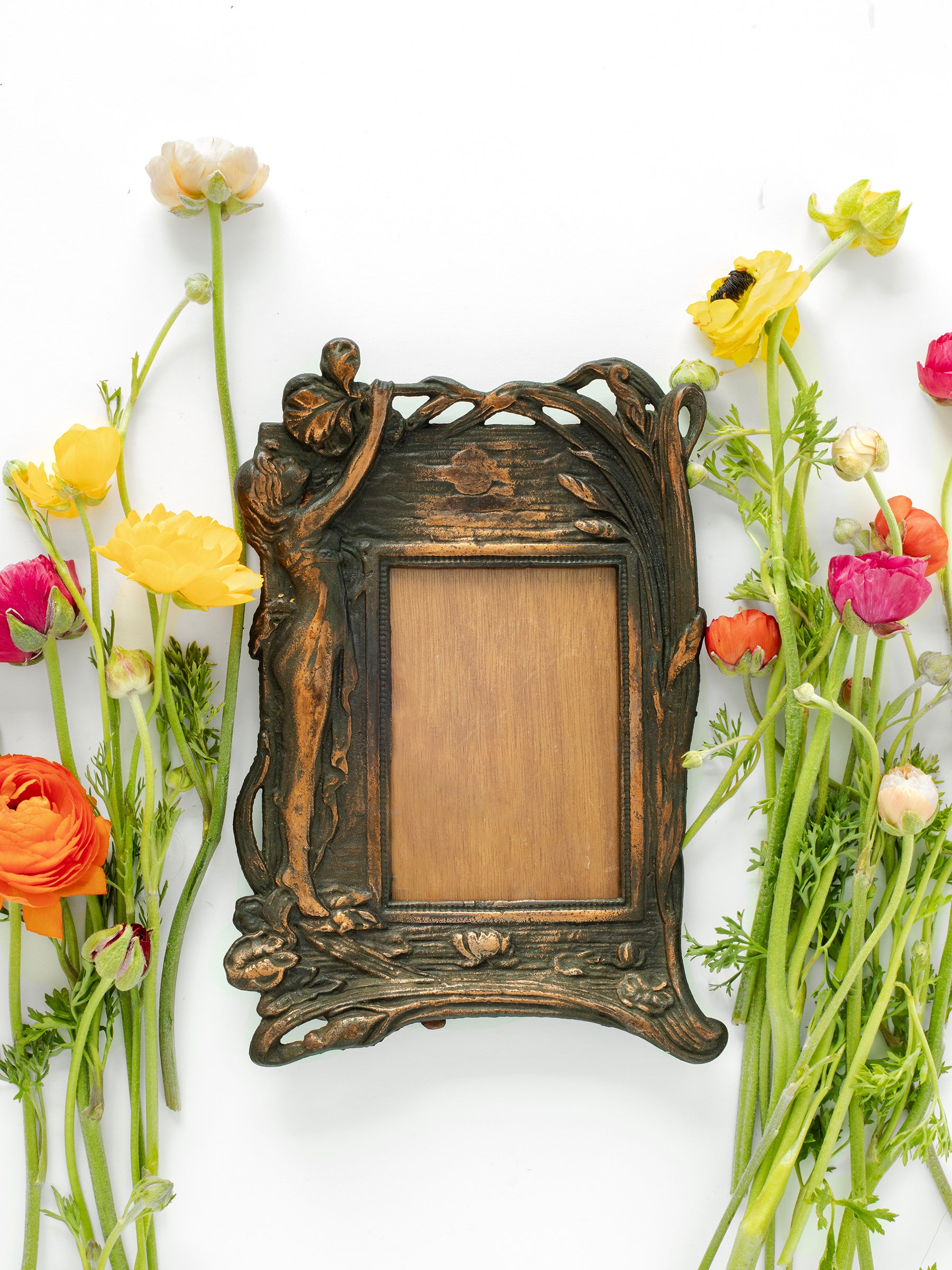 Vintage Art Deco Picture Frame Featuring a Woman, Water Lilies, & Irises with Copper & Black colors, Art Deco Floral Design with Lotus, Water Lilies, & Irises, Holds 3.5in x 5.25in photo, Cast Iron, Pedestal foot on back, Sourced in California.