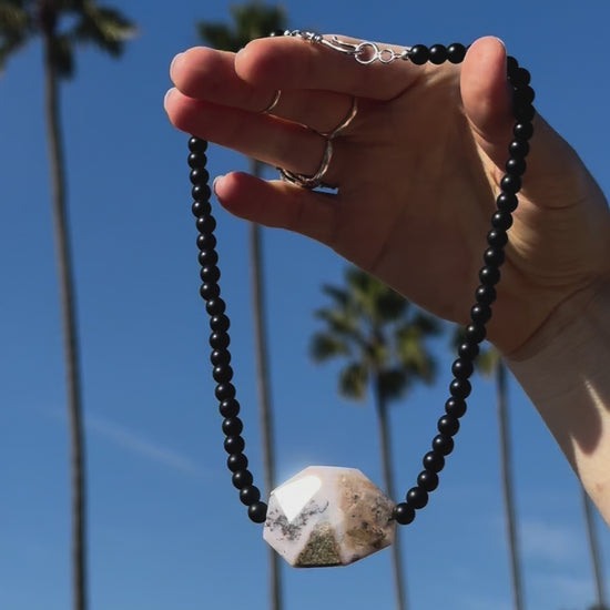 One-of-a-kind natural crystal designer bracelet with sterling silver hardware, designed & handmade in California. Crystals include Black Lava Rock &
Rhodonite.