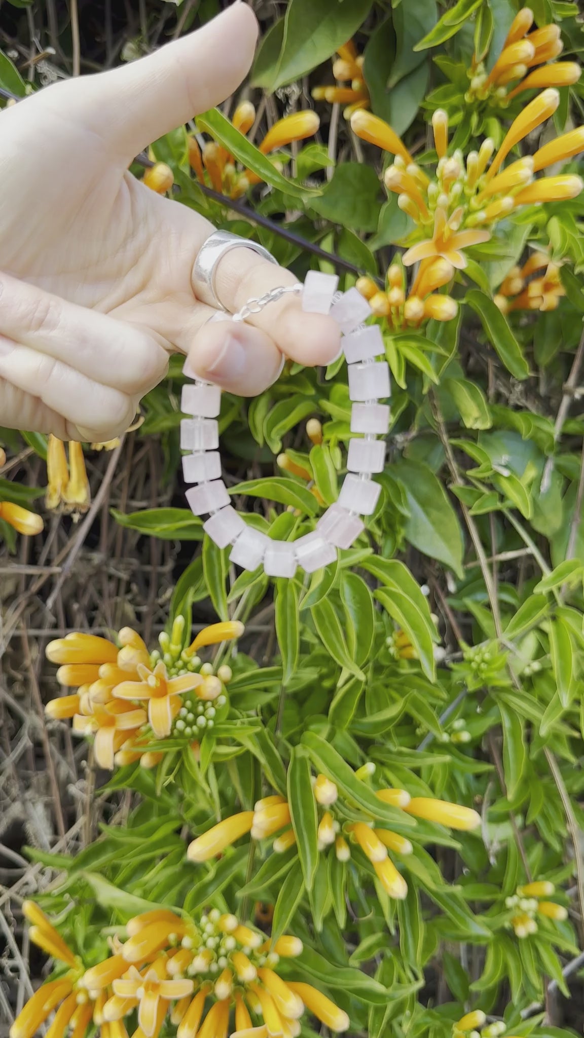 One-of-a-kind natural crystal designer bracelet with sterling silver hardware, designed & handmade in California. Crystals include Quartz & Rose Quartz.