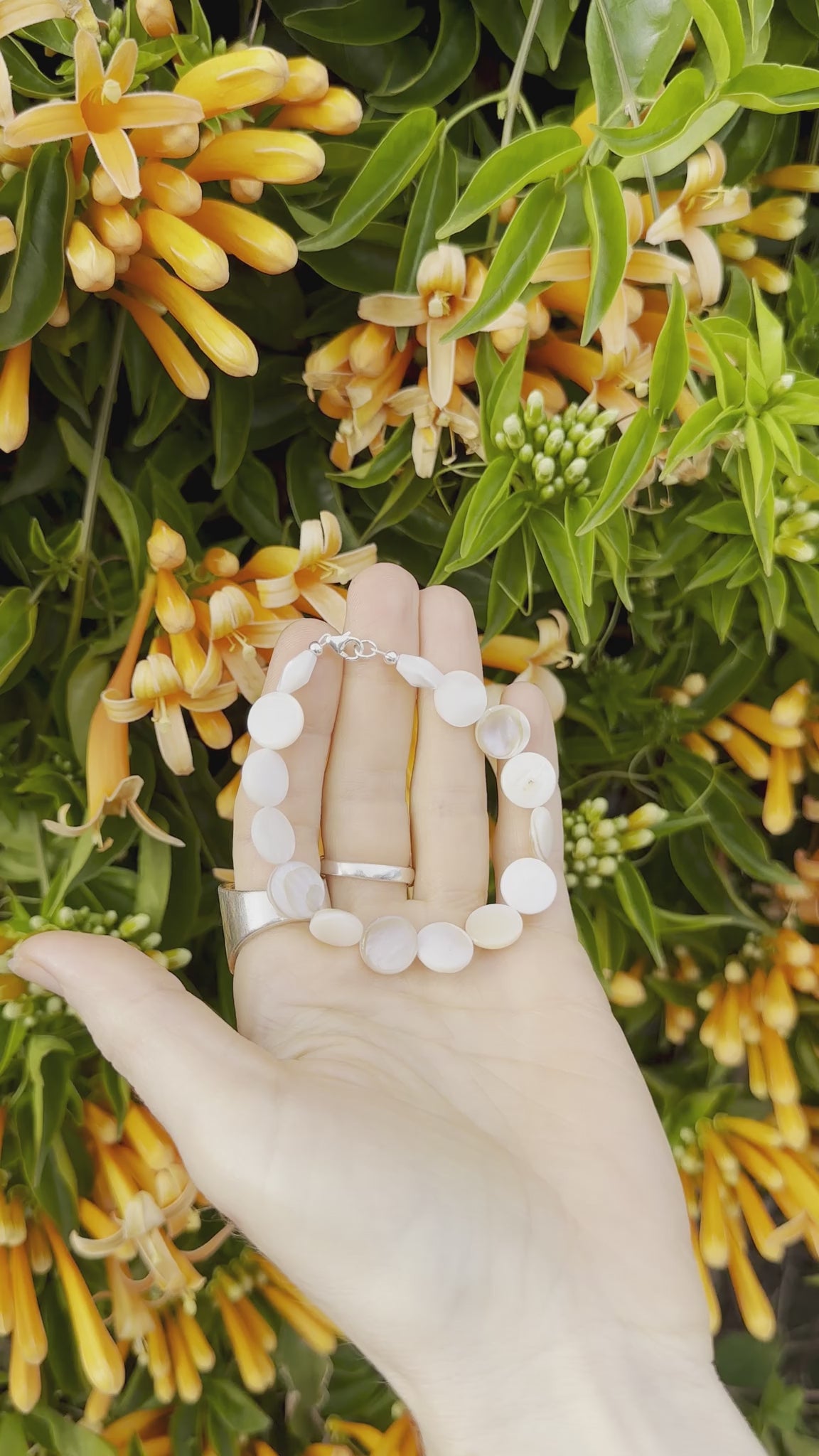 One-of-a-kind natural Mother of Pearl shell designer bracelet with sterling silver hardware, designed & handmade in California.