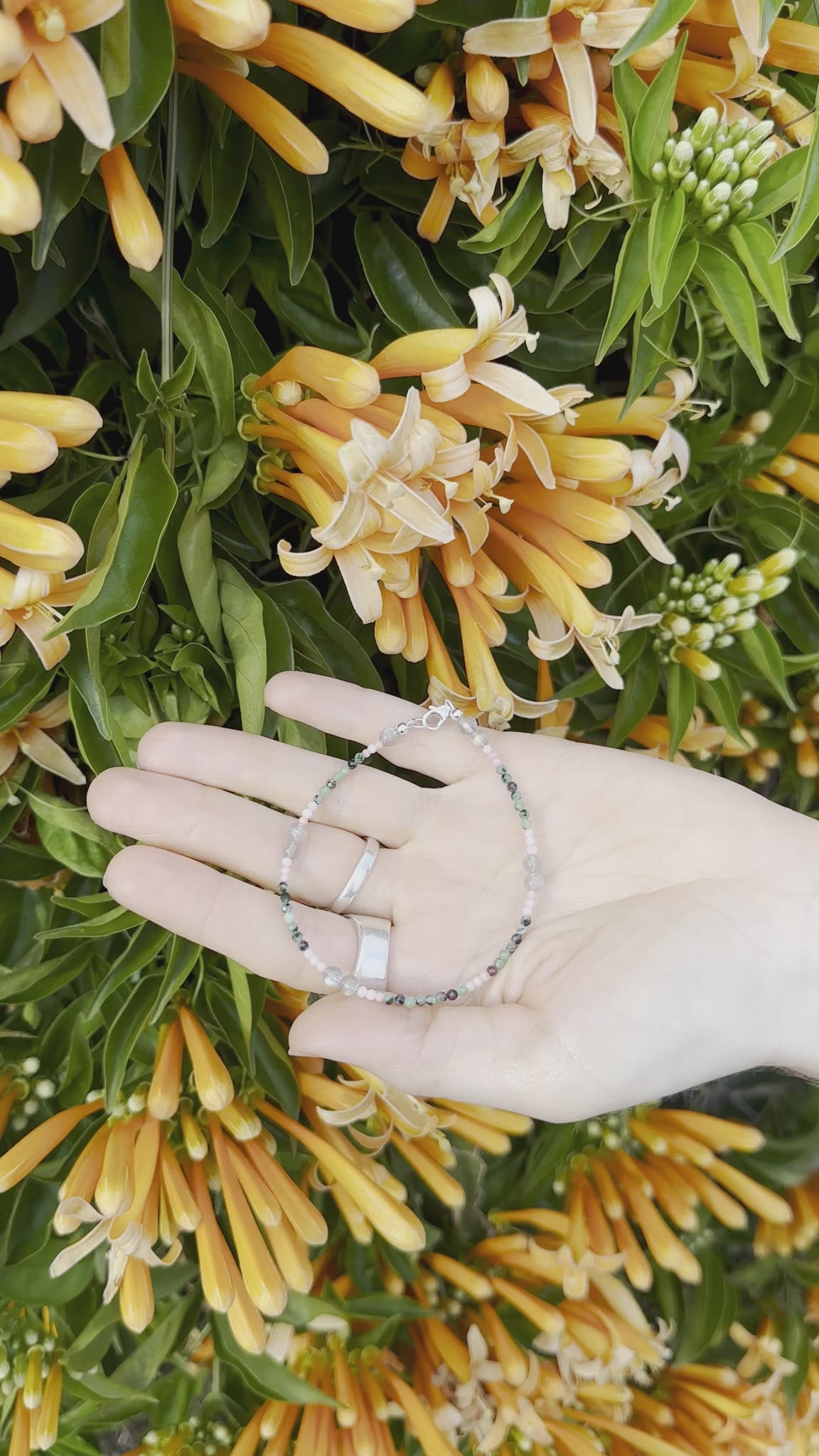 One-of-a-kind natural Labradorite, Pink Coral, & Ruby Zoasite designer bracelet with sterling silver hardware, designed & handmade in California.