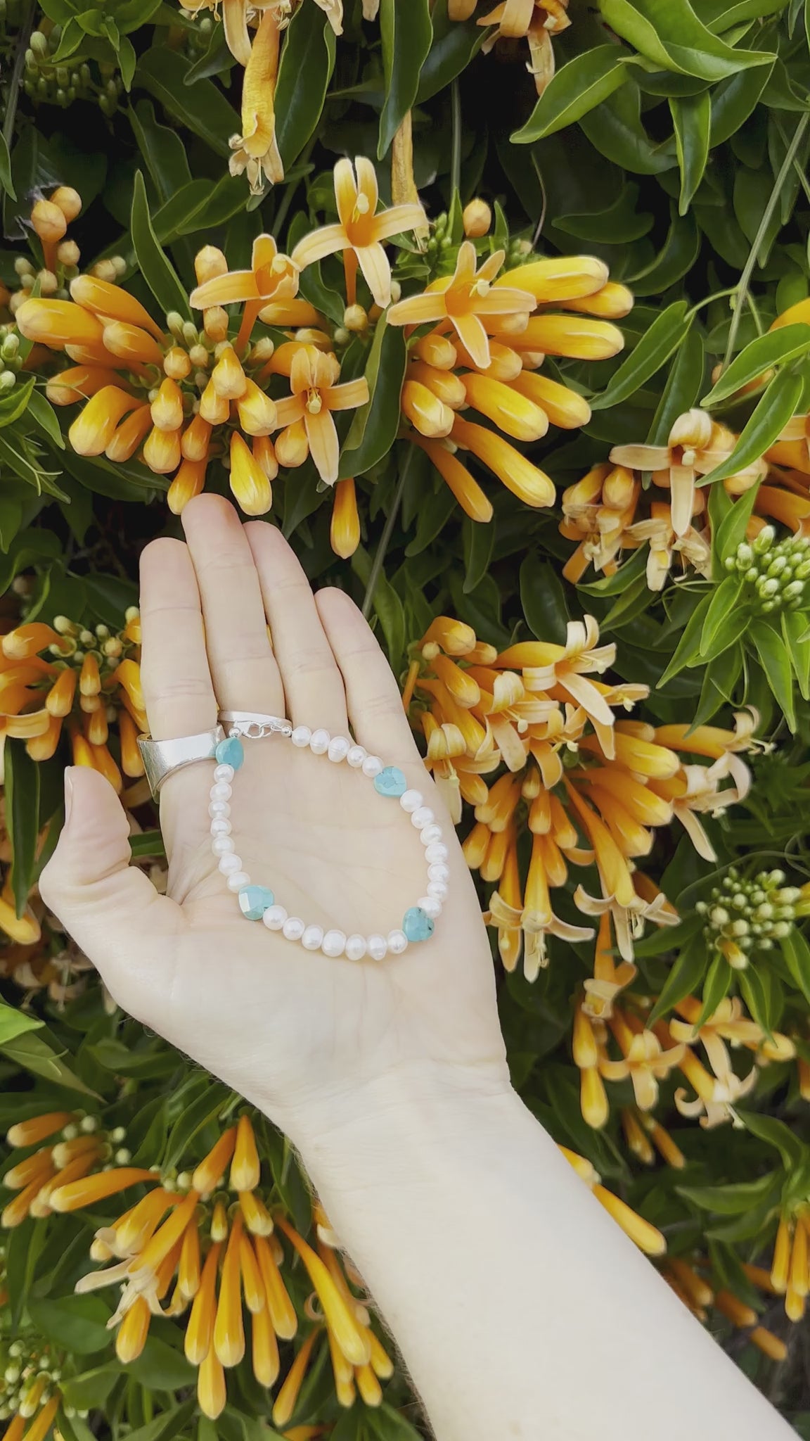 One-of-a-kind Freshwater Pearl & Turquoise designer bracelet with sterling silver hardware, designed & handmade in California.