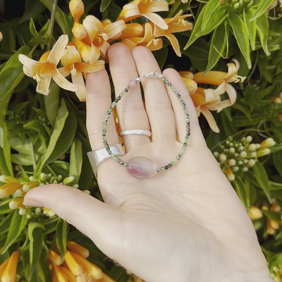 One-of-a-kind natural crystal designer bracelet with sterling silver hardware, designed & handmade in California. Crystals include Purple Fluorite, Rhodonite, & Ruby Zoasite.