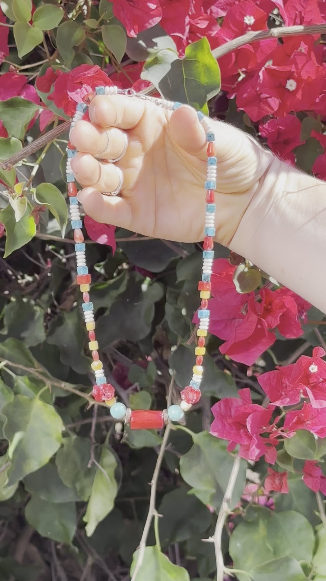 One-of-a-kind natural African Green Opal, Coconut Shell, Howlite, Red Coral, Turquoise, & Yellow Amber crystal designer bracelet with sterling silver hardware, designed & handmade in California.