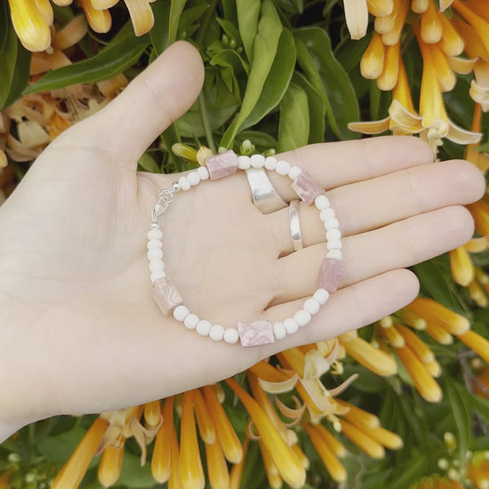 One-of-a-kind natural crystal & cow bone designer bracelet with sterling silver hardware, designed & handmade in California. Crystals are Rhodochrosite.