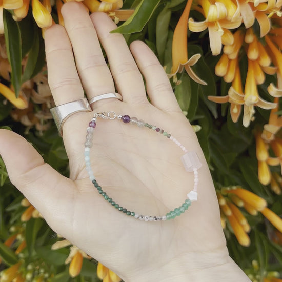 One-of-a-kind Amazonite, Amethyst, Aventurine, Labradorite, Malachite, Moonstone, Mother of Pearl, Pink Coral, Rose Quartz, & Ruby Zoisite designer bracelet with sterling silver hardware, designed & handmade in California.