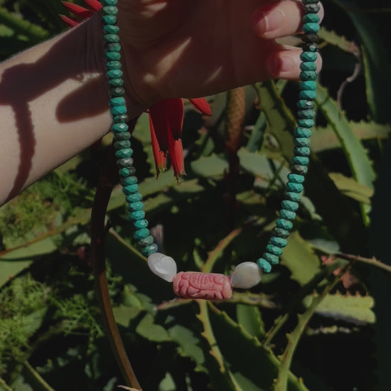 One-of-a-kind natural crystal & stone designer bracelet with sterling silver hardware, designed & handmade in California. Stones are Freshwater Pearls, Pink Coral, & Turquoise.