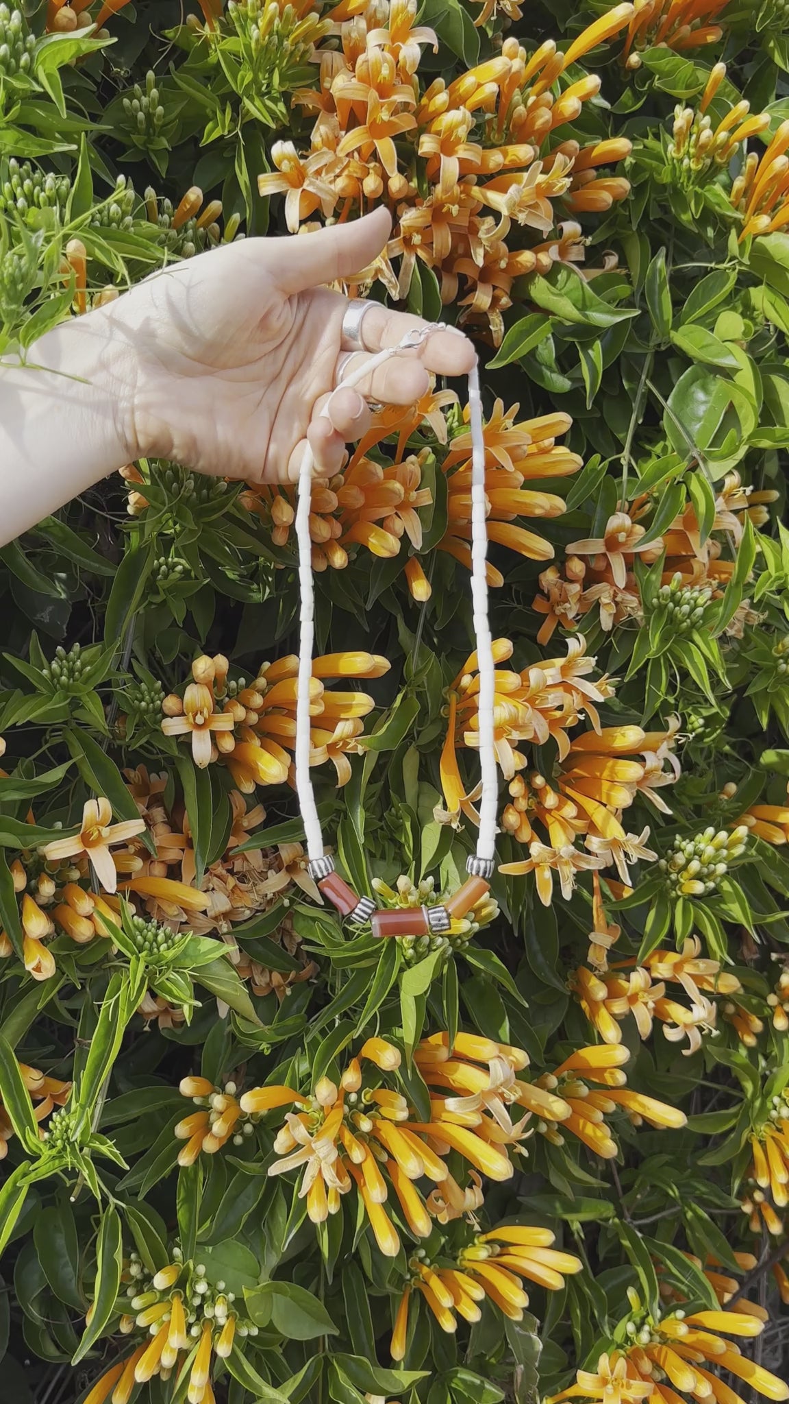 One-of-a-kind natural shell & stone designer necklace with sterling silver hardware, designed & handmade in California.