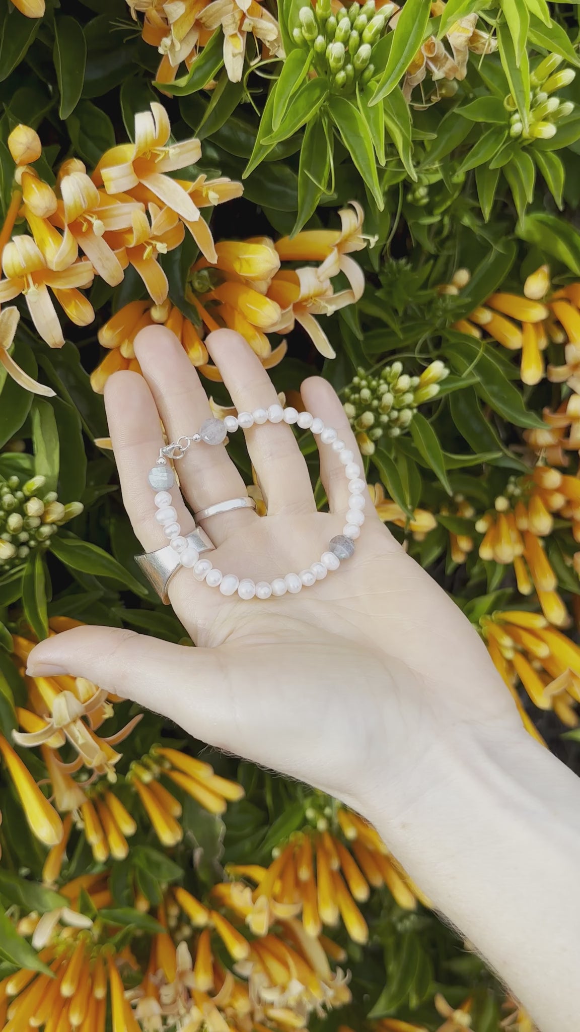 One-of-a-kind Freshwater Pearl & Labradorite crystal designer bracelet with sterling silver hardware, designed & handmade in California.