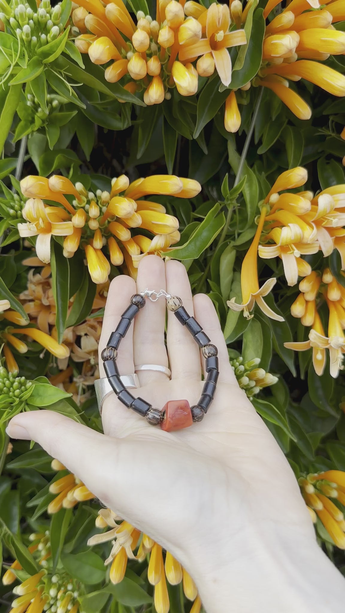 One-of-a-kind natural Red & Black Coral & Coconut Shell designer bracelet with coconut shells & sterling silver hardware, designed & handmade in California.